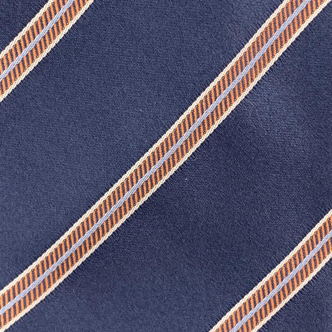 BRIONI necktie comes in steel blue silk satin with all over white and orange diagonal stripe print. Made in italy.

Excellent Pre-Owned Condition.

Width: 3.75 in.