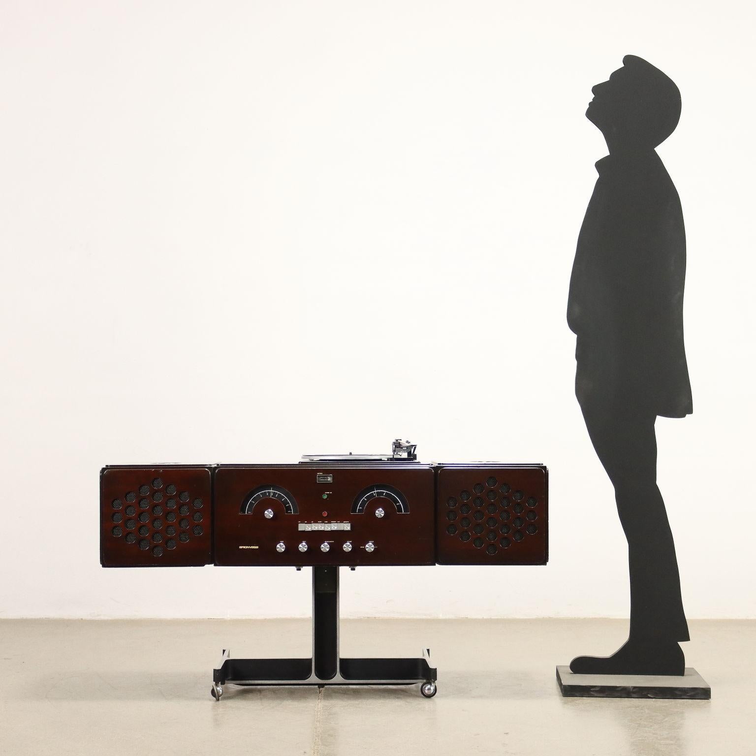 Iconic Radiophonograph designed by brothers Achille and Pier Giacomo Castiglioni, with body and cases in wood and support in cast aluminum. The case is missed.
