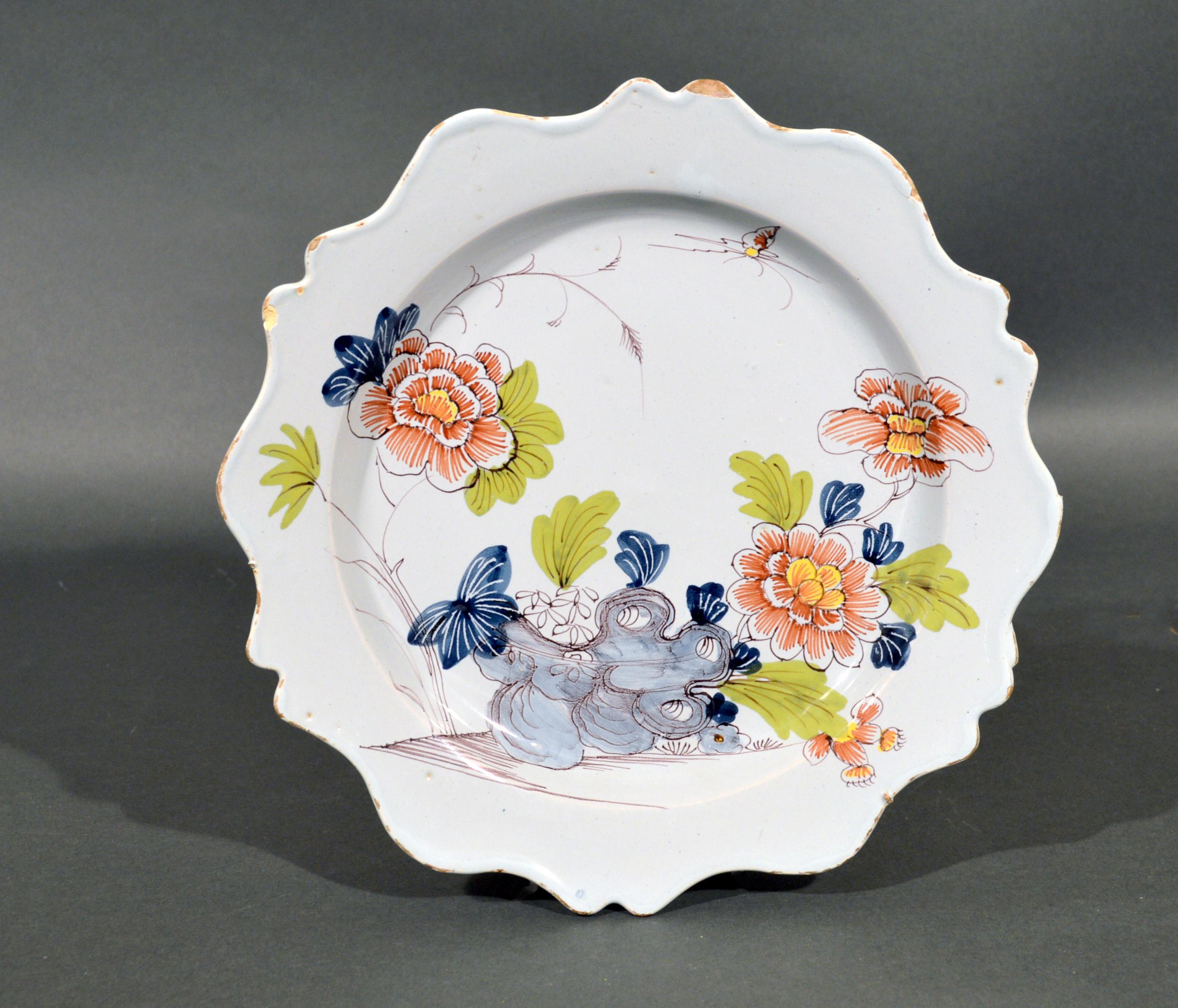 Wonderful set of six Bristol delftware polychrome Chinoiserie scalloped plates,
Redbank Back Factory,
Circa 1760

The plates have a most appealing, bright coloration and a lovely and unusual shape- very appealing on the table or wall.

The set of