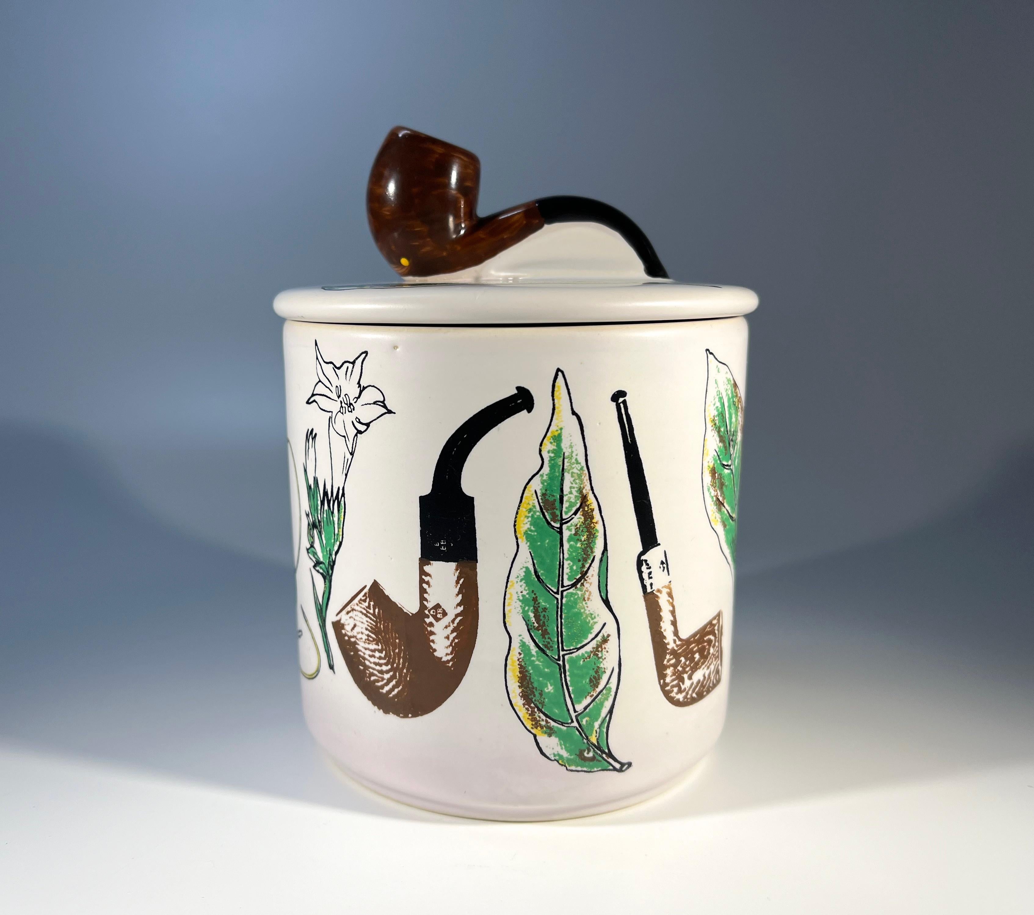 Marvellous mid-century modern, pipe themed ceramic hand-painted humidor tobacco jar by BBB
Made by BBB in Denmark for Britain's Best Briars company
Stamped BBB, Made In Denmark on base
The lid has a rubber band
Circa Mid-20th Century
Height 5.5