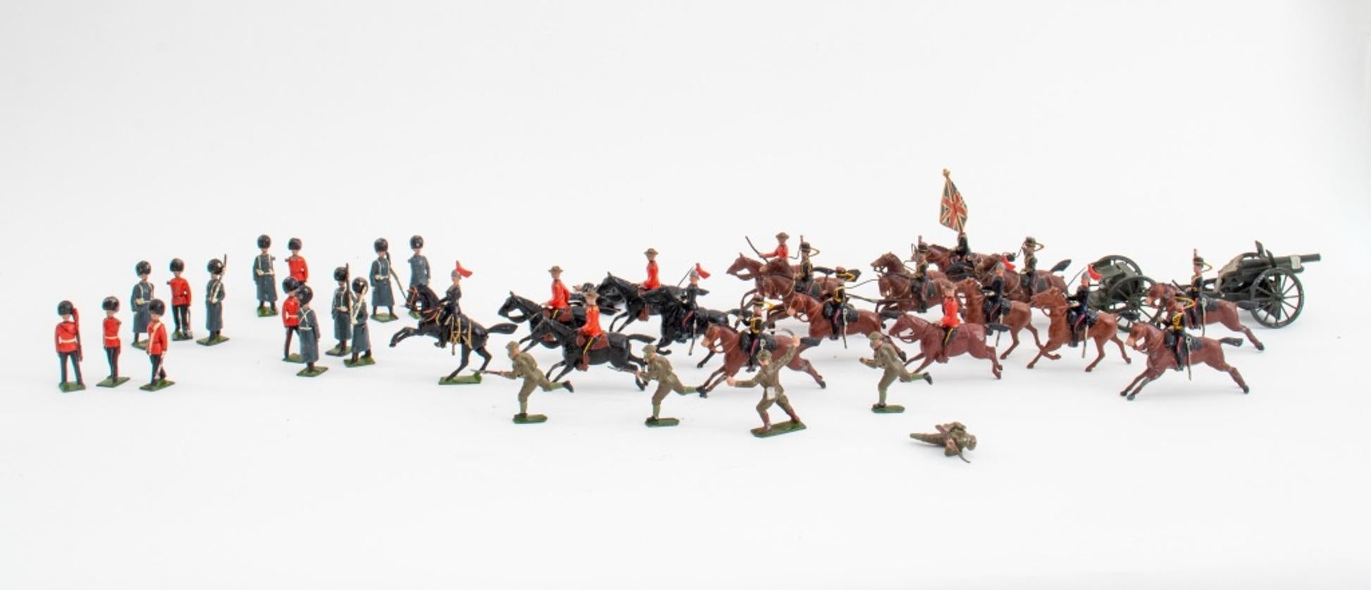 Britain's Ltd. miniature artillery carrriage and group of painted lead soldiers, 33, likley 1970's, each marked variously 