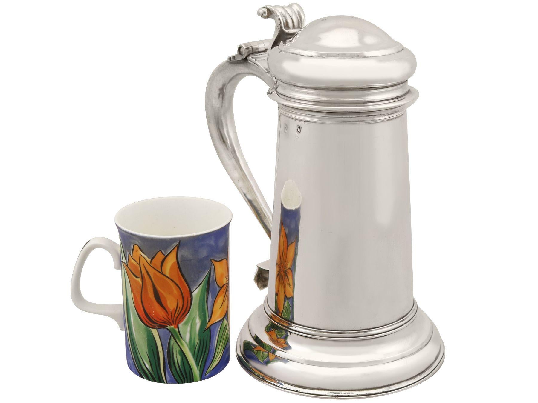 An exceptional, fine and impressive antique Queen Anne English Britannia standard silver tankard; an addition to our range of collectable 18th century silverware

This exceptional antique Queen Anne Britannia standard silver tankard has a plain