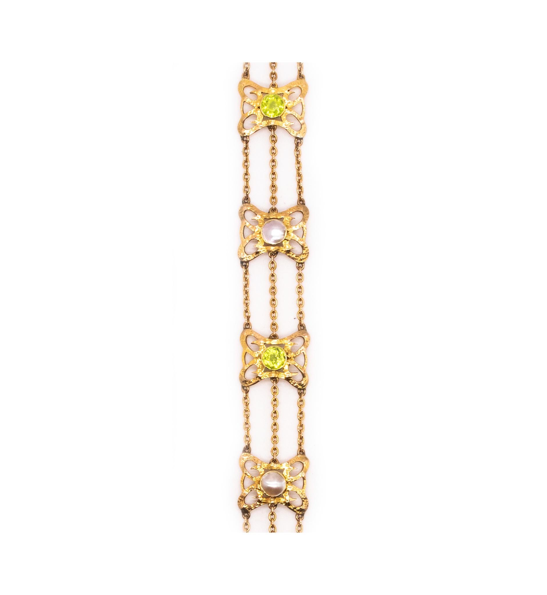 Women's British 1900 Liberty Art and Craft Bracelet in 15 Cts with Pearls and Peridots For Sale