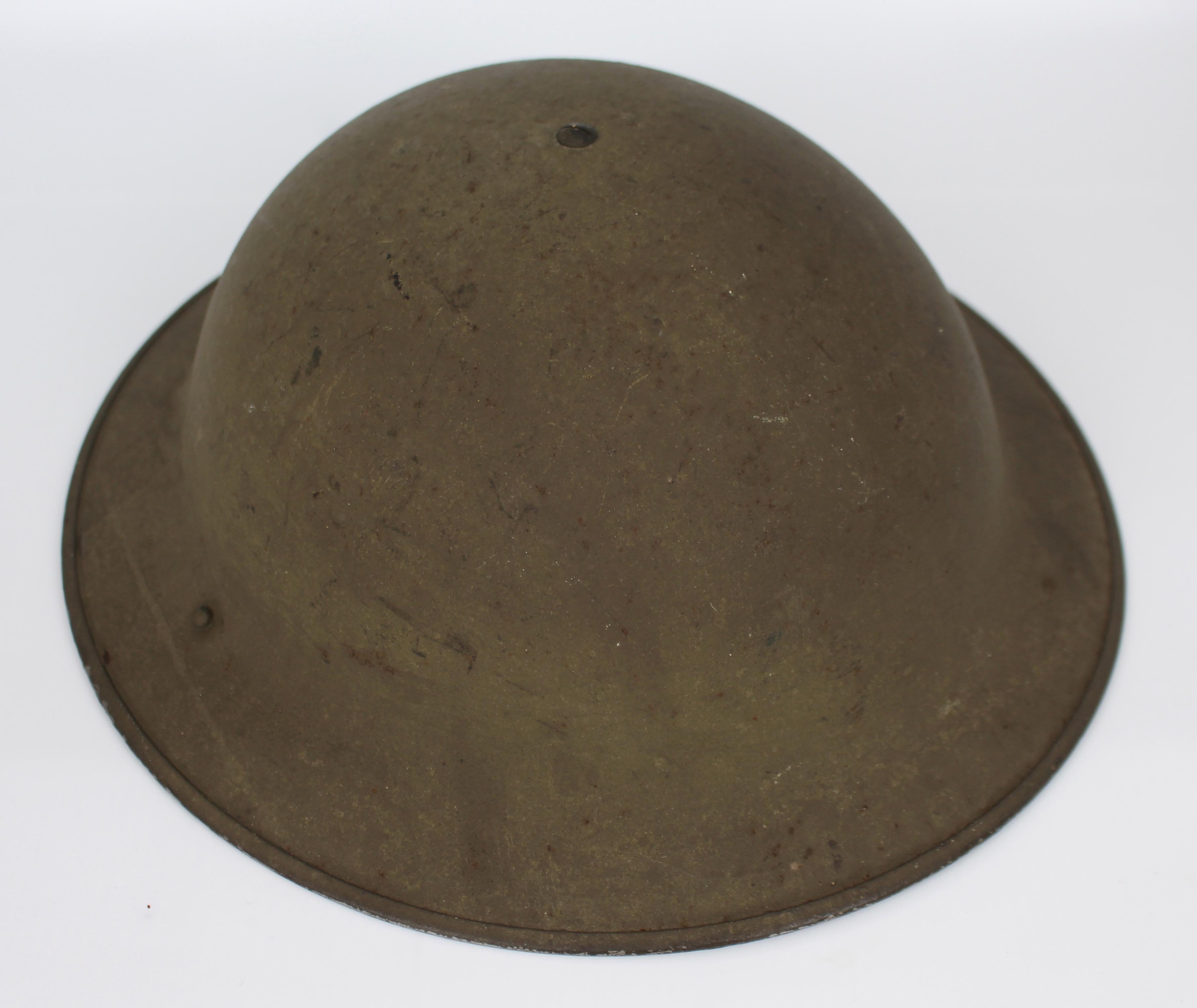 British Army WW2 MkII Brodie Helmet


British military. WW2. Marks to underside of rim 