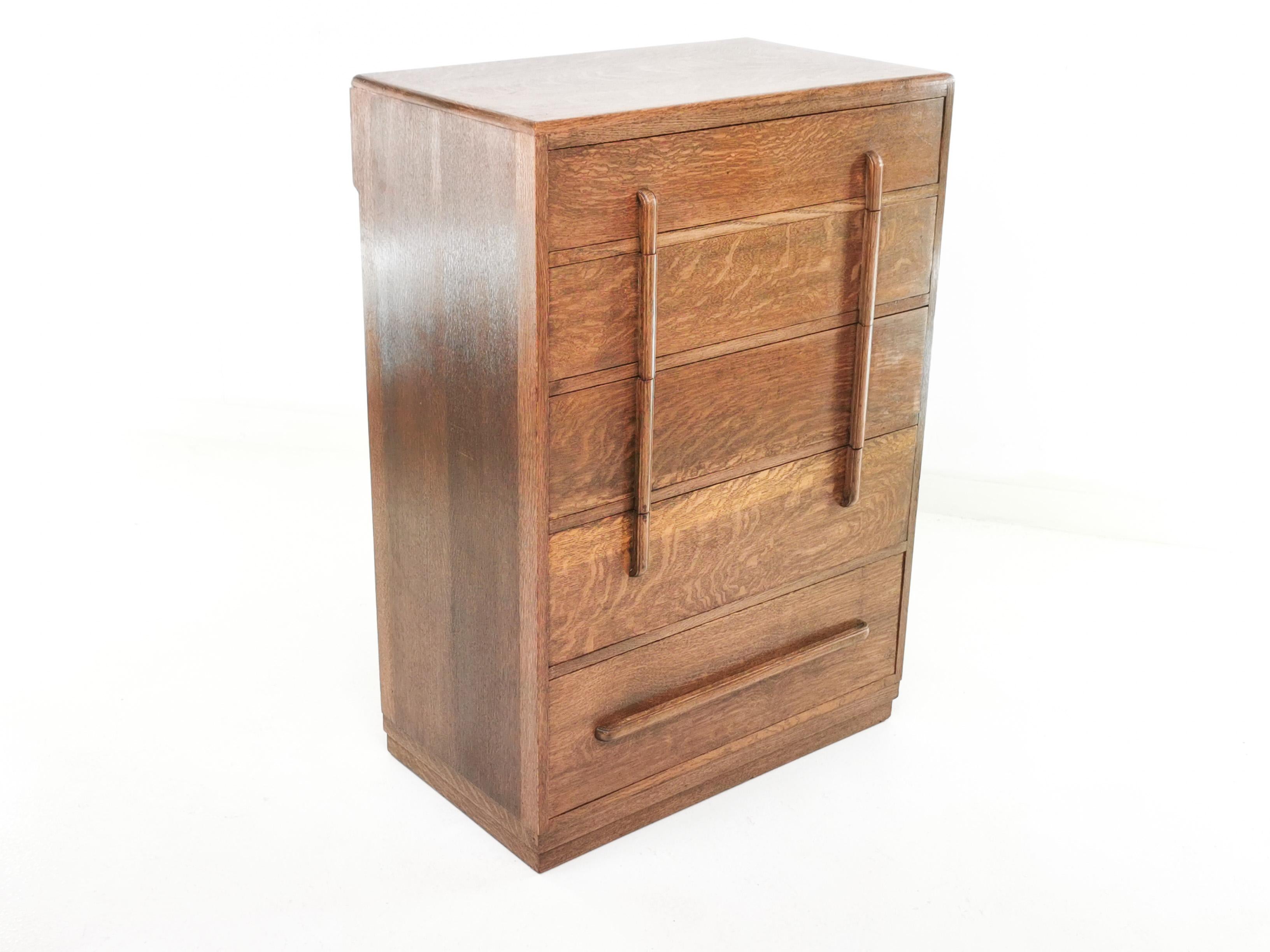 Art Deco chest of drawers 

Exquisite art deco chest of drawers by Bowman Bros Ltd, Camden Town, London. English, circa 1940s. 

Its five long drawers afford ample storage space, while its top features a moulded edge for additional aesthetic