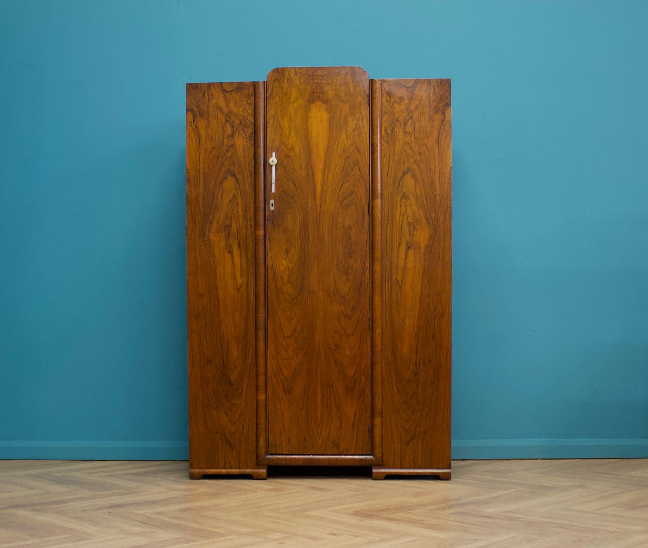 An Art Deco style walnut wardrobe - circa 1950's
Fitted out with a clothes rail