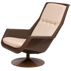 British Brown Acrylic Swivel Lounge Chair by Robin Day for Hille