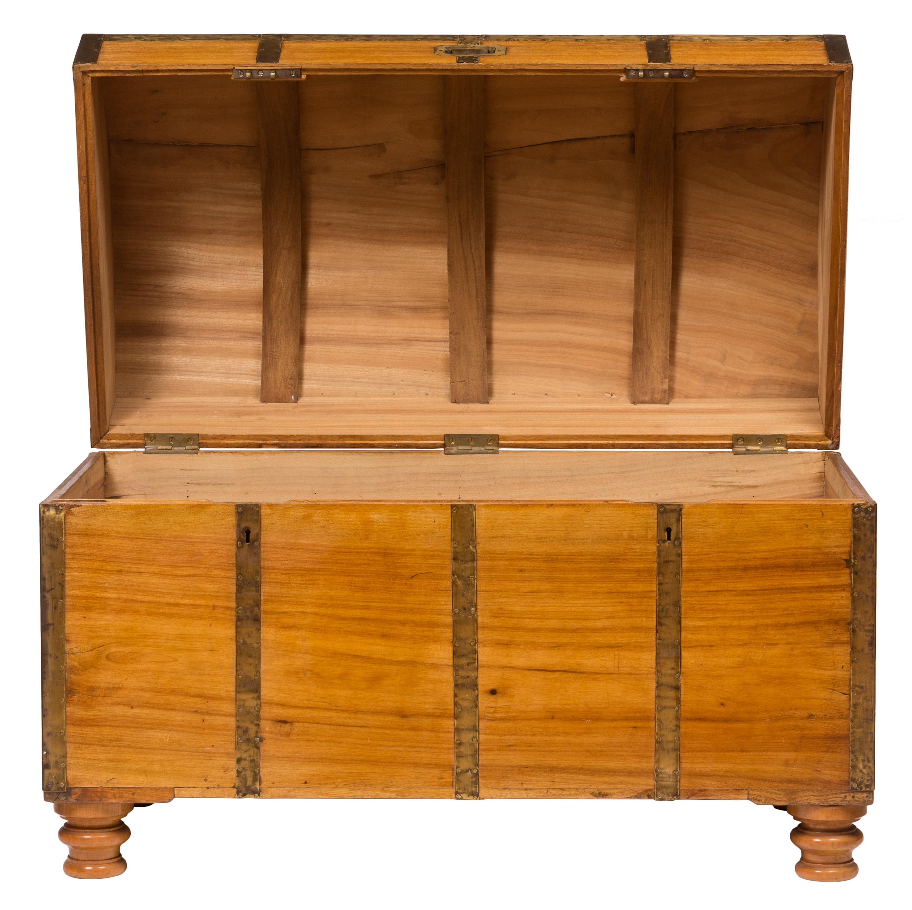 A late 19th century arched top camphor wood British military campaign chest, with original brass hardware. Built of durable materials and designed for travel, these rugged wooden chests were originally developed to carry the belongings of military