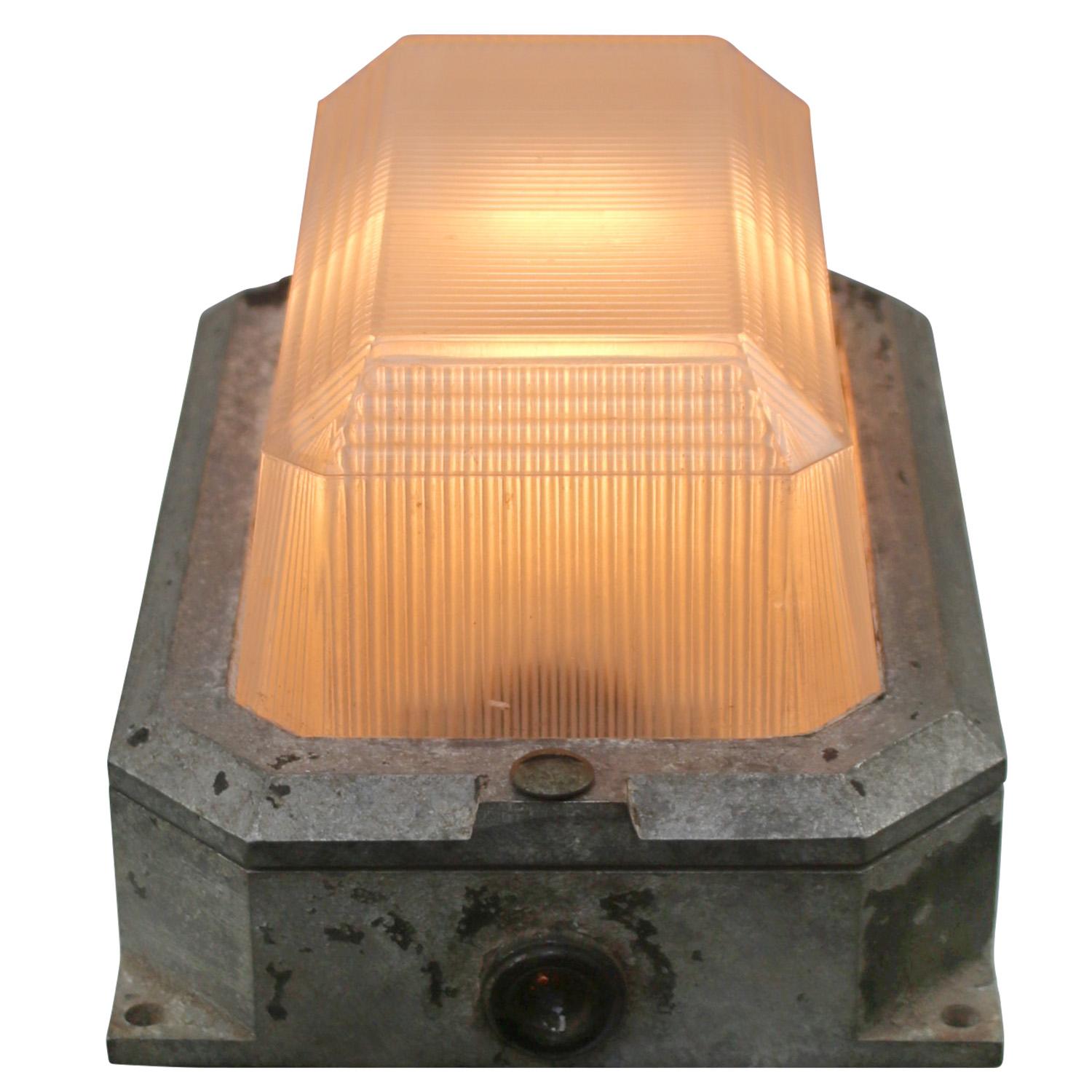 British Industrial wall or ceiling lamp
Cast aluminium, mat frosted prismatic glass

B22 bulb holder

Weight: 2.80 kg / 6.2 lb

Priced per individual item. All lamps have been made suitable by international standards for incandescent light bulbs,