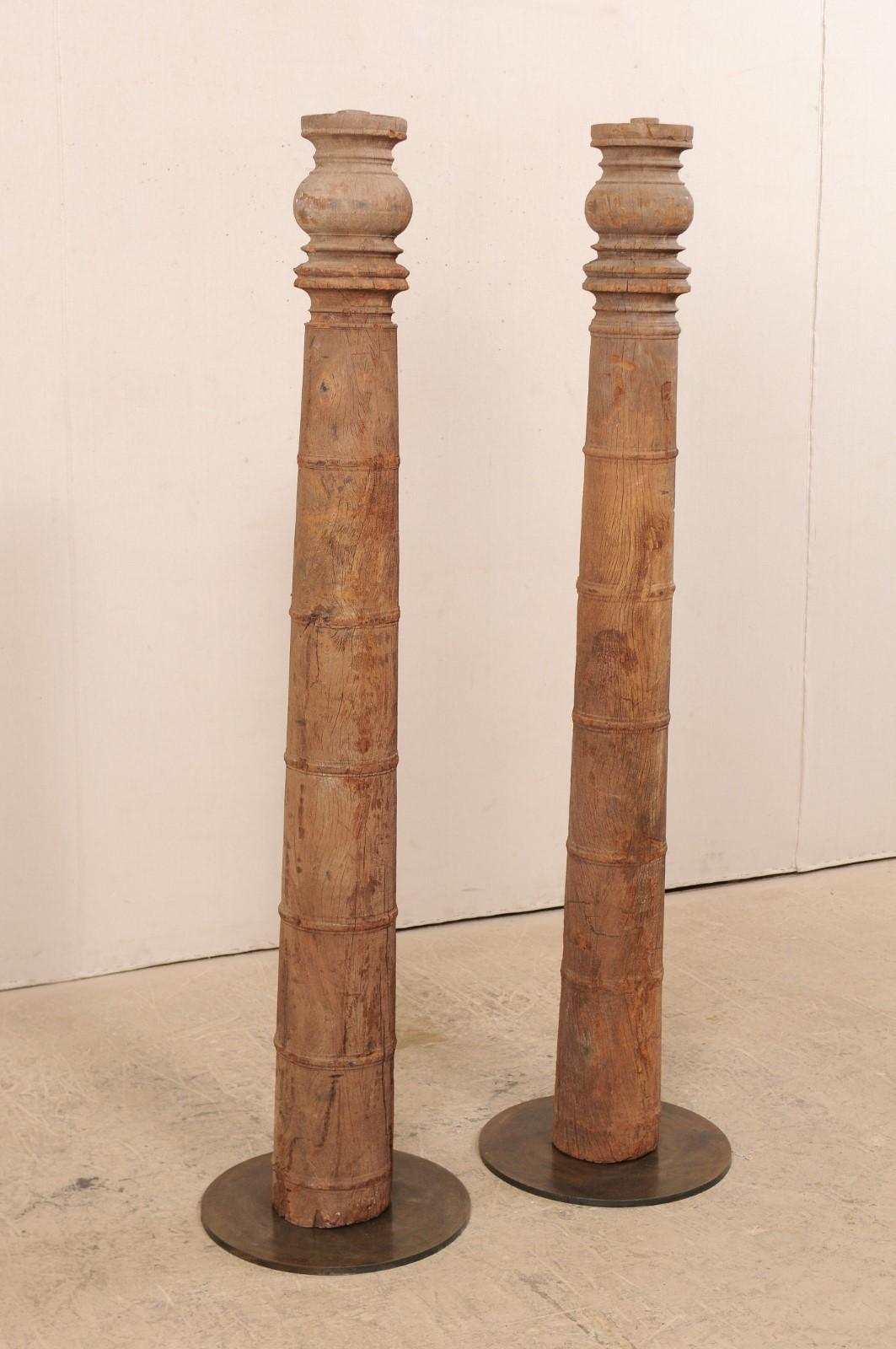 carved wooden columns