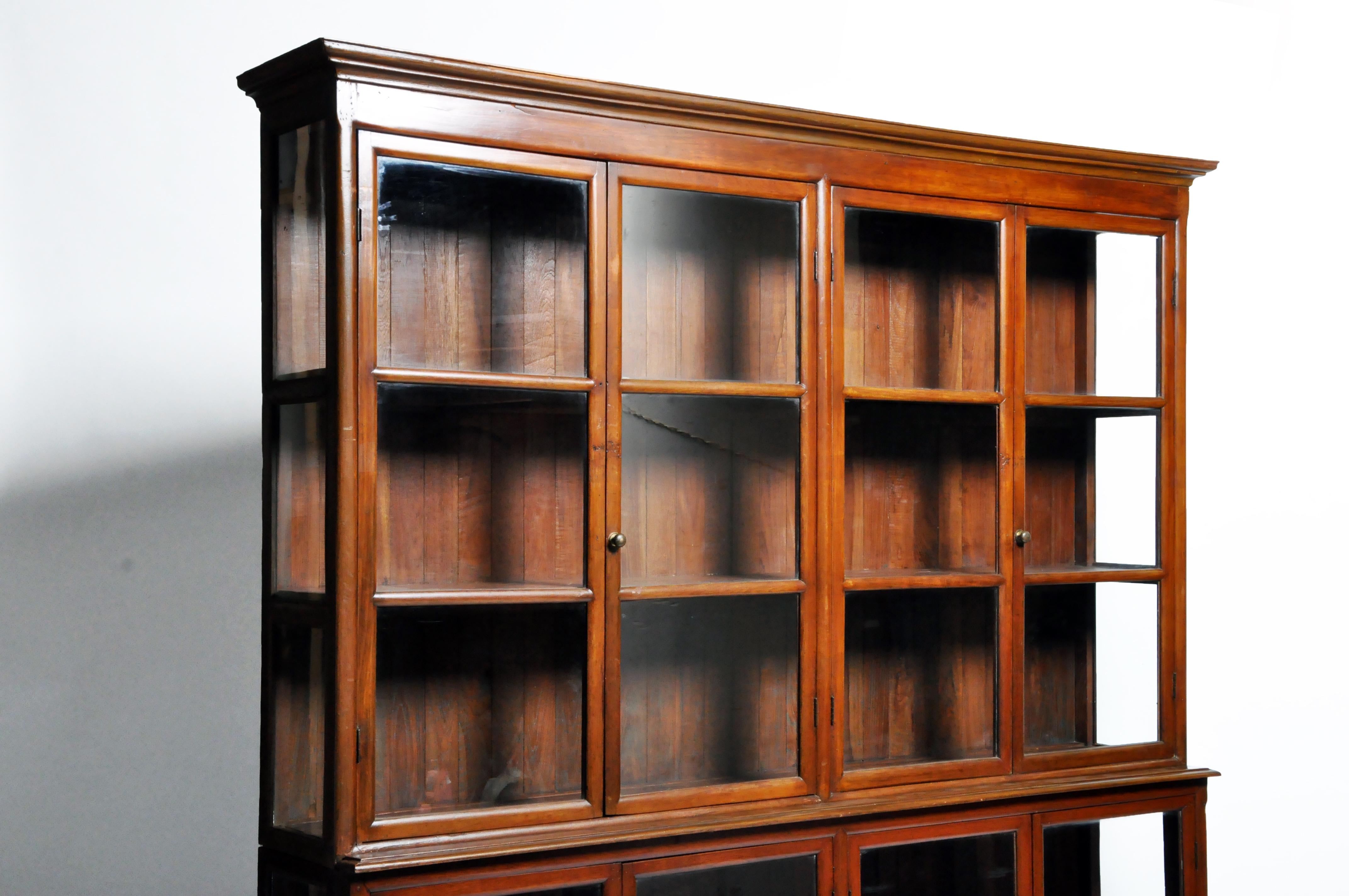 British Colonial Art Deco Breakfront Bookcase with Four Pairs of Doors In Good Condition In Chicago, IL