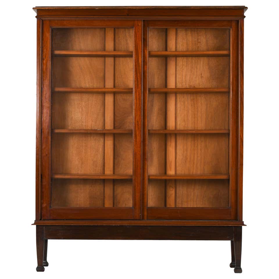 British Colonial Bookcase Sliding Teak Doors, 1950s For Sale at 1stDibs
