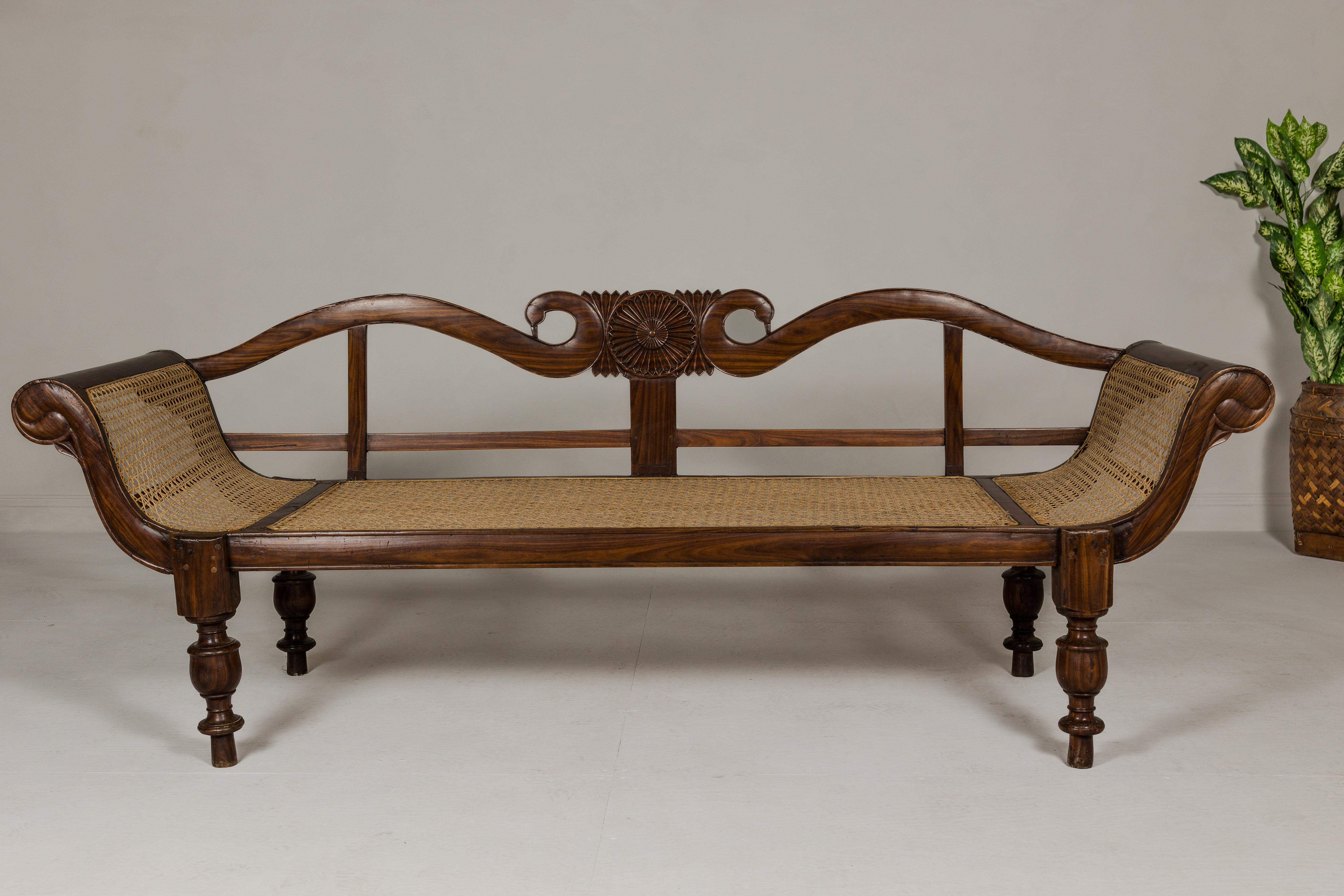 British Colonial Carved and Cane Settee with Swan Neck Back and Scrolling Arms For Sale 2