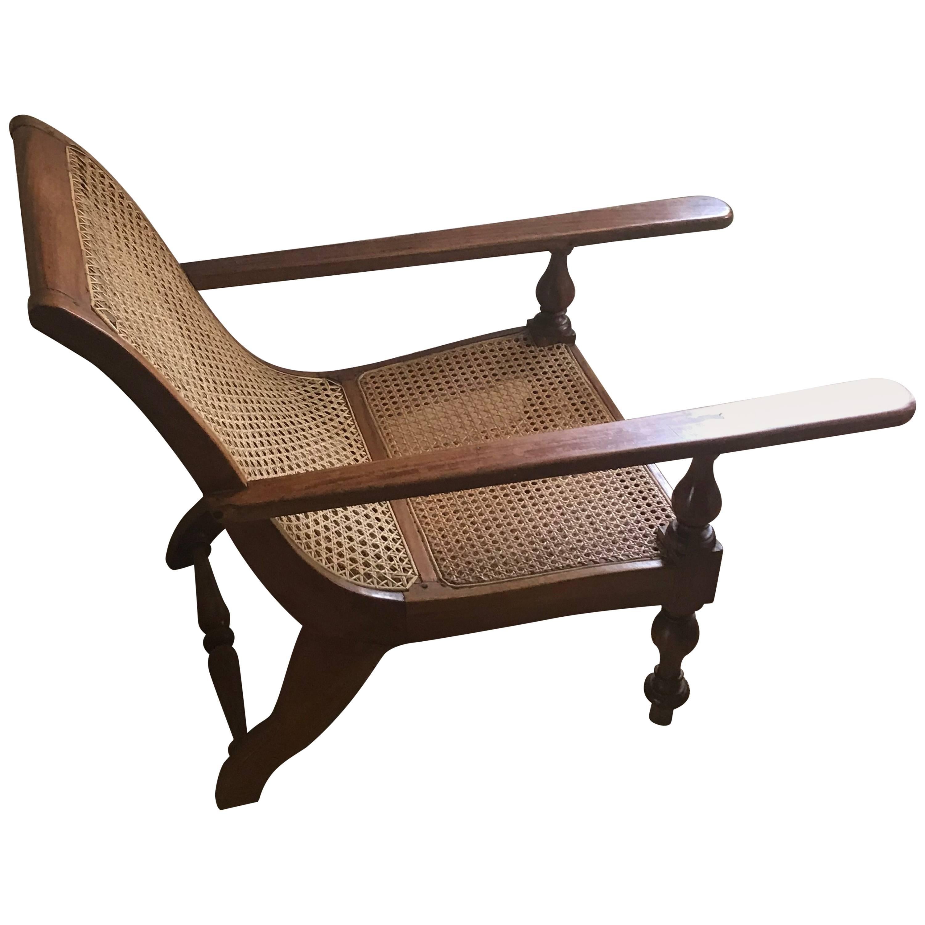 British Colonial, Ceylonese, Satinwood Caned Long Arm Baby Planters Chair