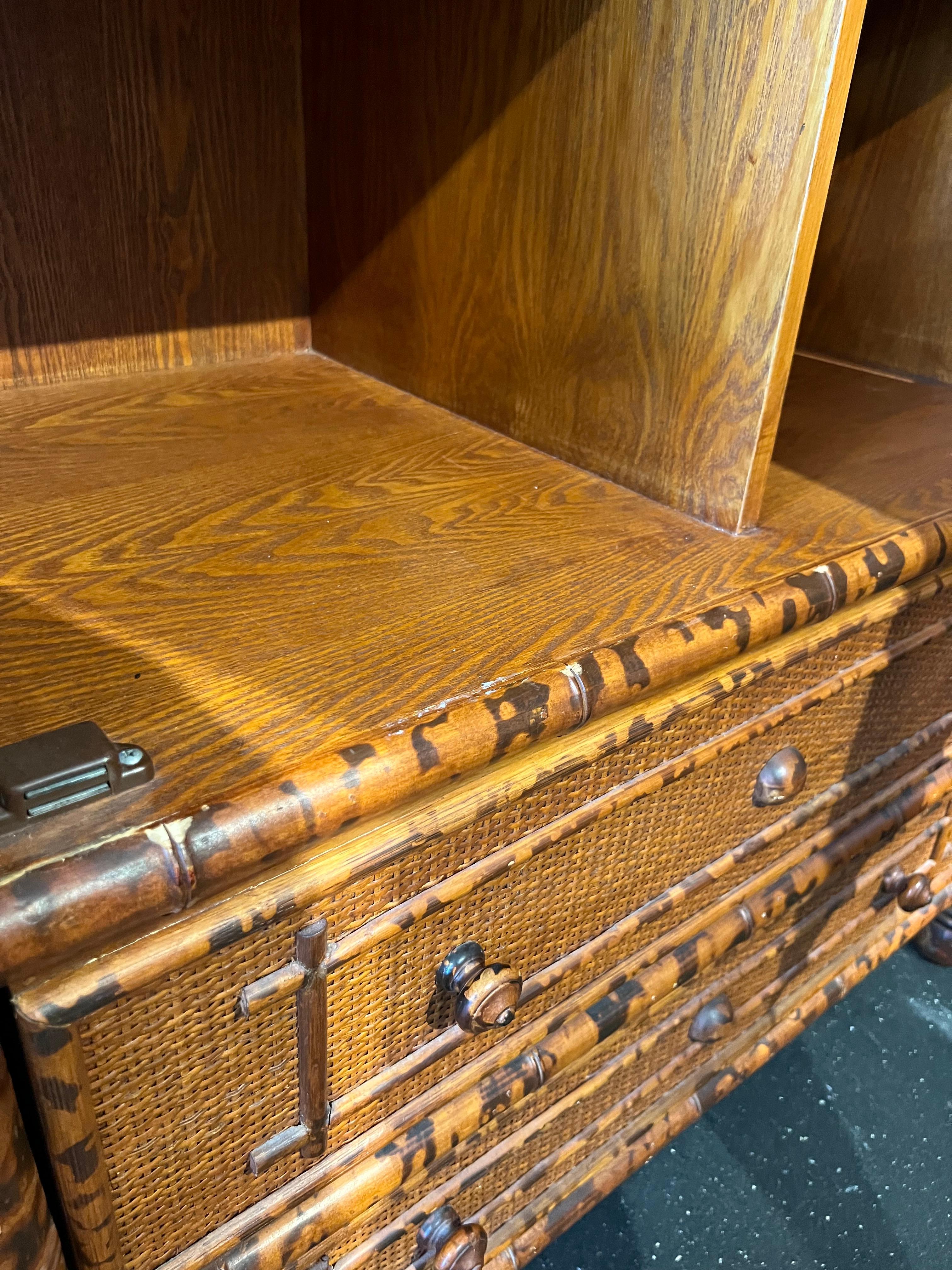 British Colonial Style Burnt Bamboo and Cane Armoire For Sale at 1stDibs