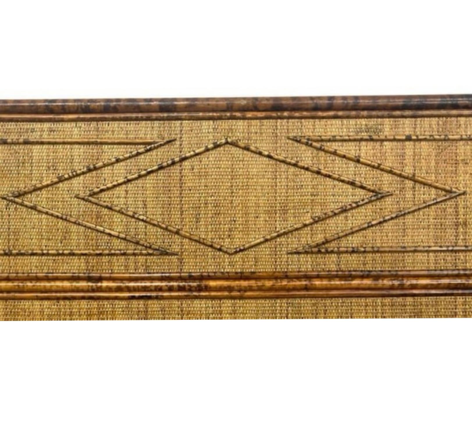 This is a British Colonial style burnt bamboo and grasscloth queen size headboard. I believe it to be a more recent interpretation of the bamboo crafted in England as part of the Aesthetic movement of the later part of the 19th century. Condition :