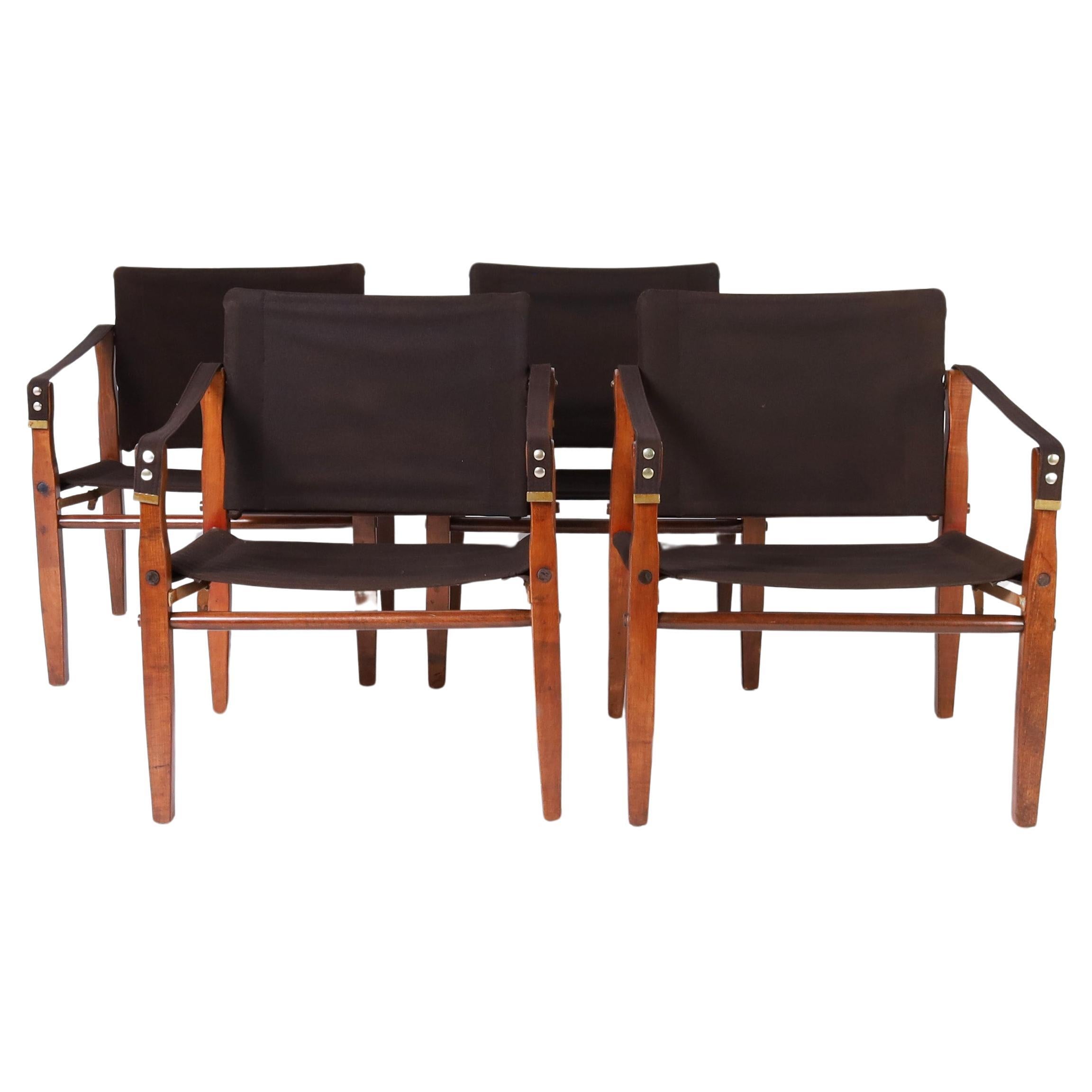 British Colonial Style Set of Four Safari Chairs For Sale