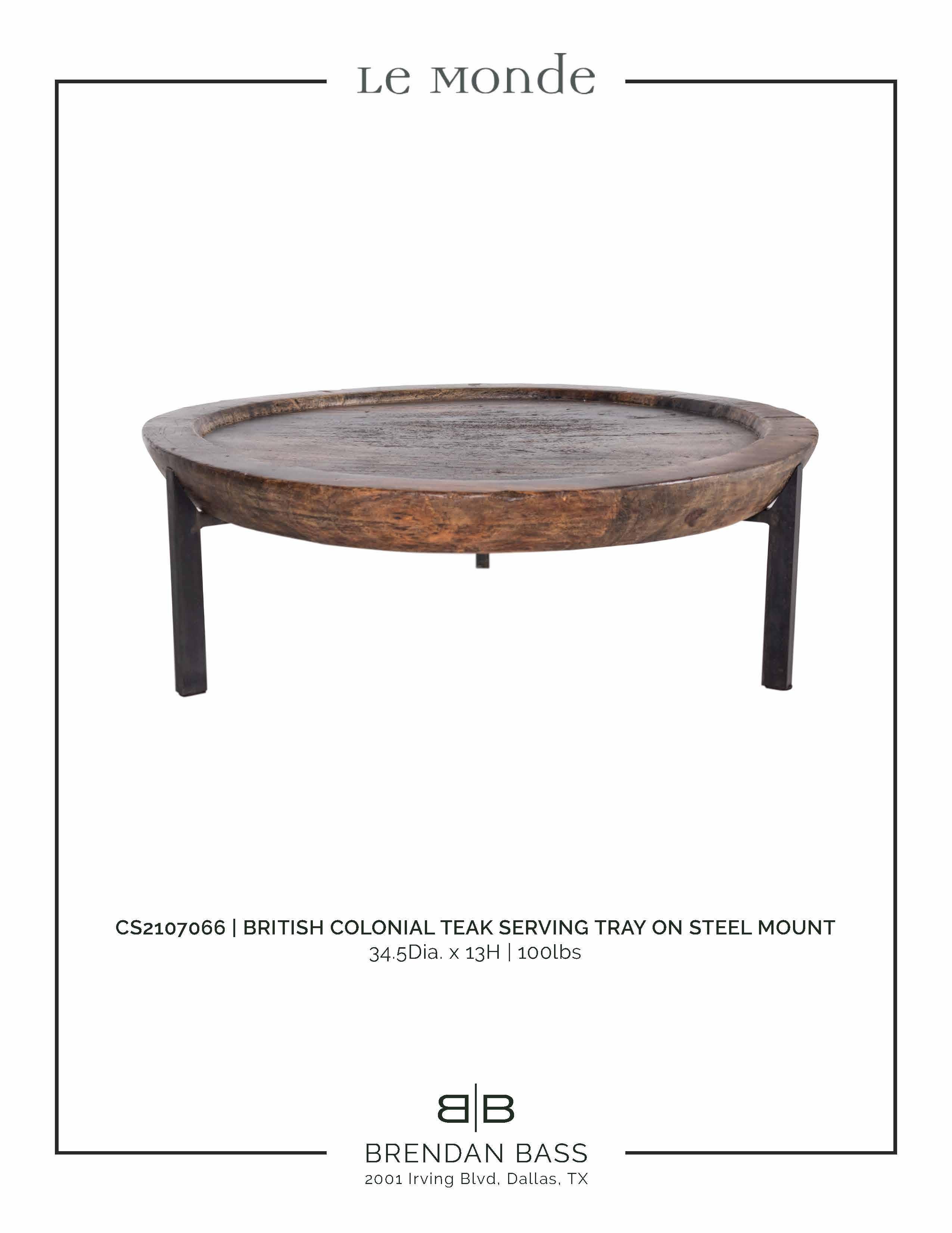 British colonial vintage teak serving tray on steel mount. 

Piece from the Le Monde collection. Exclusive to Brendan Bass.
   