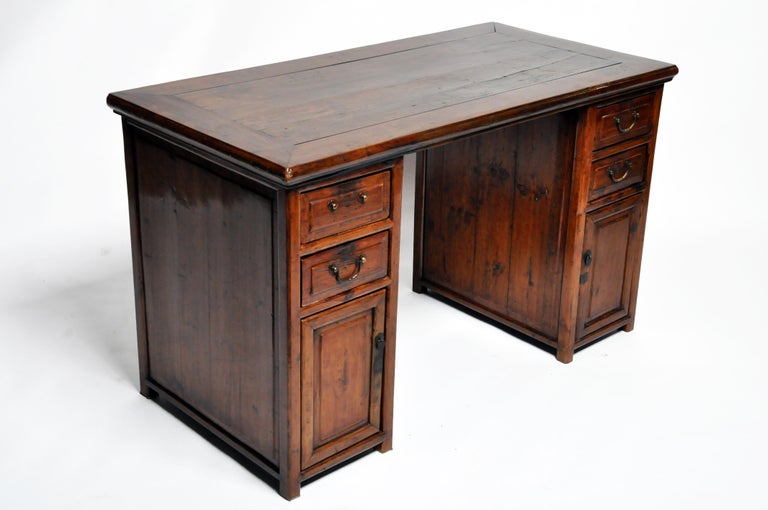 British Colonial Wooden Desk with Four Drawers and Two Doors at 1stDibs