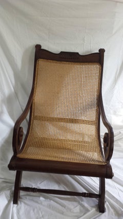 British Colonial, Ceylonese, Mahogany Rolled Arm Caned Steamers Chair