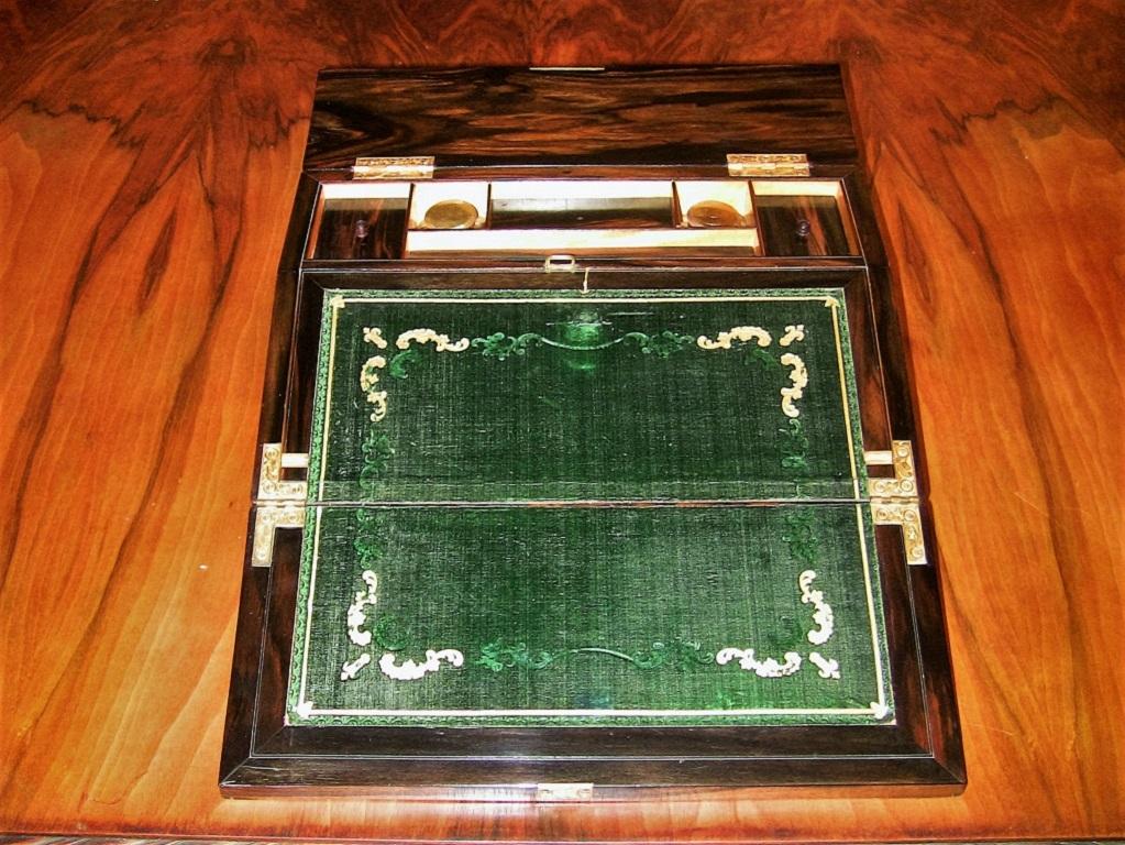 Absolutely exceptional example of a mid-19th century writing slope/box.
Made circa 1860 from rare and expensive Coromandel wood from the Asian colonies of the British Empire.
Inlaid with brass, gorgeous mother-of-pearl, fantastically cast brass