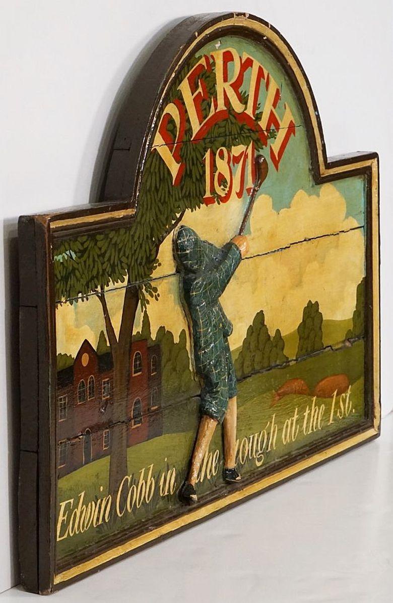 A decorative British pub sign (one-sided) featuring a three-dimensional relief painting of an early period golfer in full swing, entitled: Perth, 1871 - Edwin Cobb in the rough at the 1st

A very fine example of vintage advertising artwork and ready