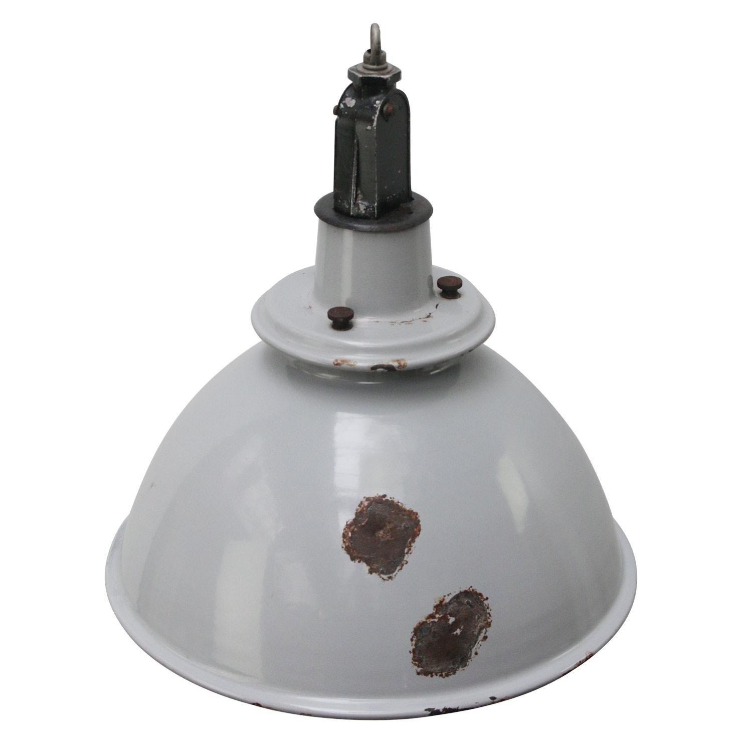 British vintage industrial hanging pendant. Gray enamel with white interior. Metal top. 

Weight: 3.2 kg / 7.1 lb 

Priced per individual item. All lamps have been made suitable by international standards for incandescent light bulbs,