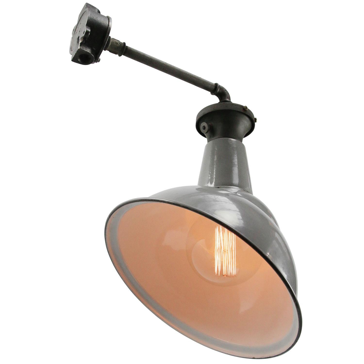 Vintage industrial wall light by Benjamin, UK
Gray enamel, cast iron top and wall base

diameter wall mount 10 cm

E27/E26

Weight: 3.00 kg / 6.6 lb

Priced per individual item. All lamps have been made suitable by international standards