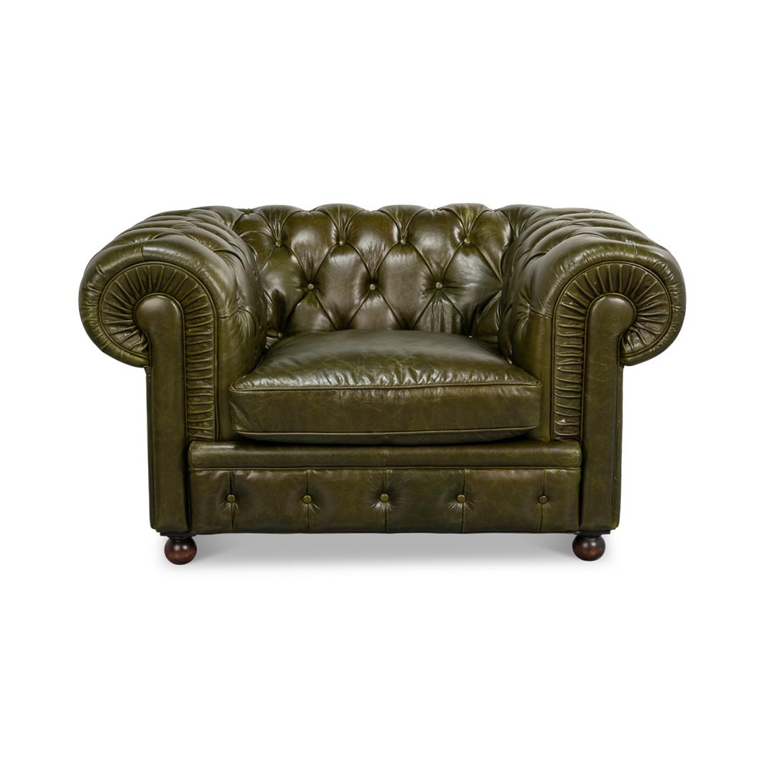 Crafted from premium top-grain leather, its rich olive green tone infuses warmth and opulence into any space. The iconic rolled arms and pleated armrests highlight meticulous craftsmanship, while the button-tufted upholstery brings timeless grandeur