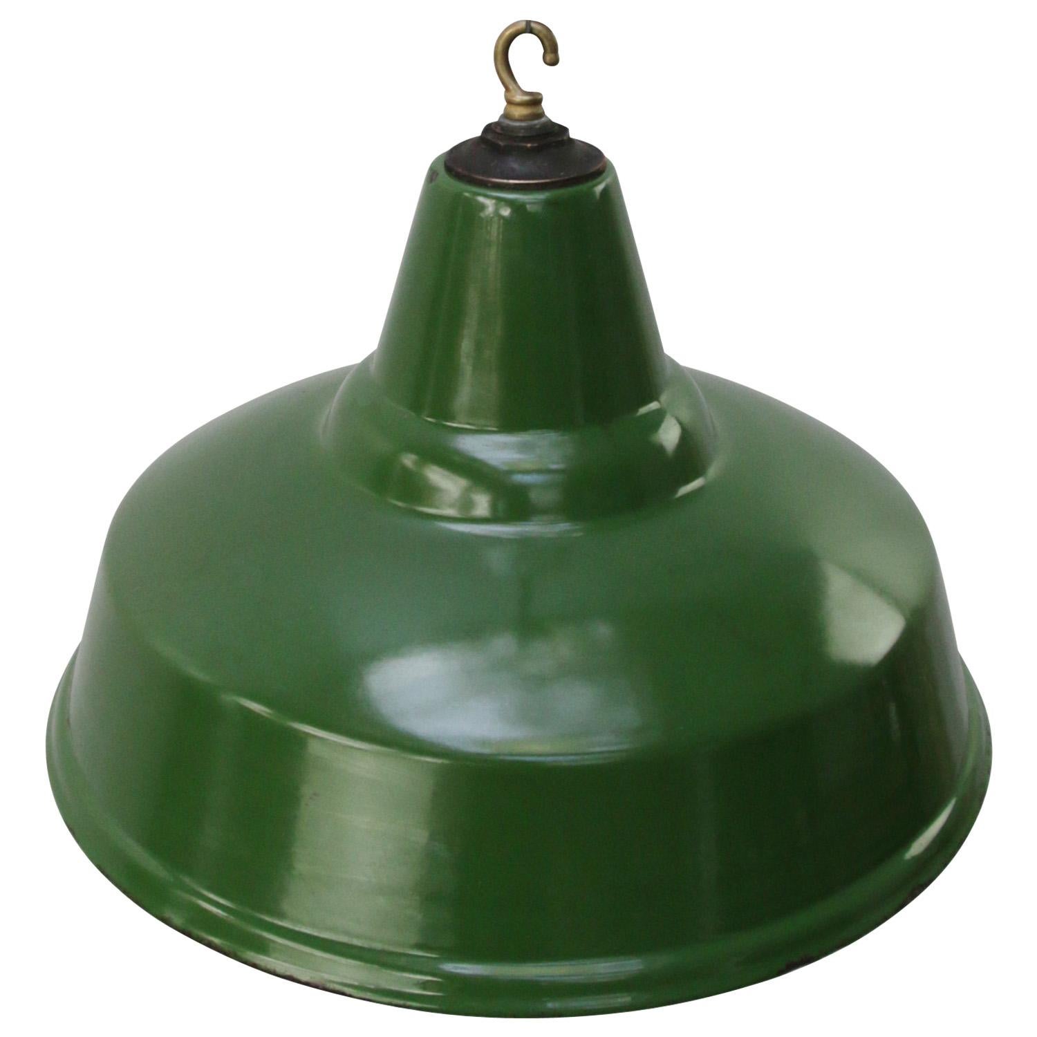 Vintage British green enamel industrial pendant lamp
white interior

Weight: 2.10 kg / 4.6 lb

Priced per individual item. All lamps have been made suitable by international standards for incandescent light bulbs, energy-efficient and LED bulbs.