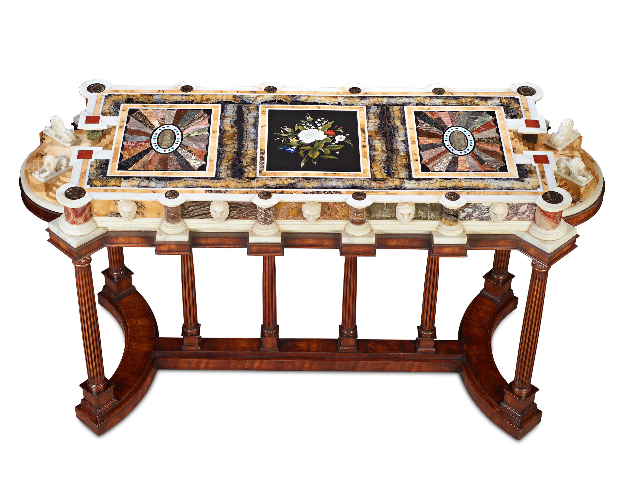 Among the most beautiful examples of hardstone artistry that has ever entered our collection, this important British surtout de table is in a class all its own. Its powerful architectural elegance, timeless Greco-Roman design, impressive size and