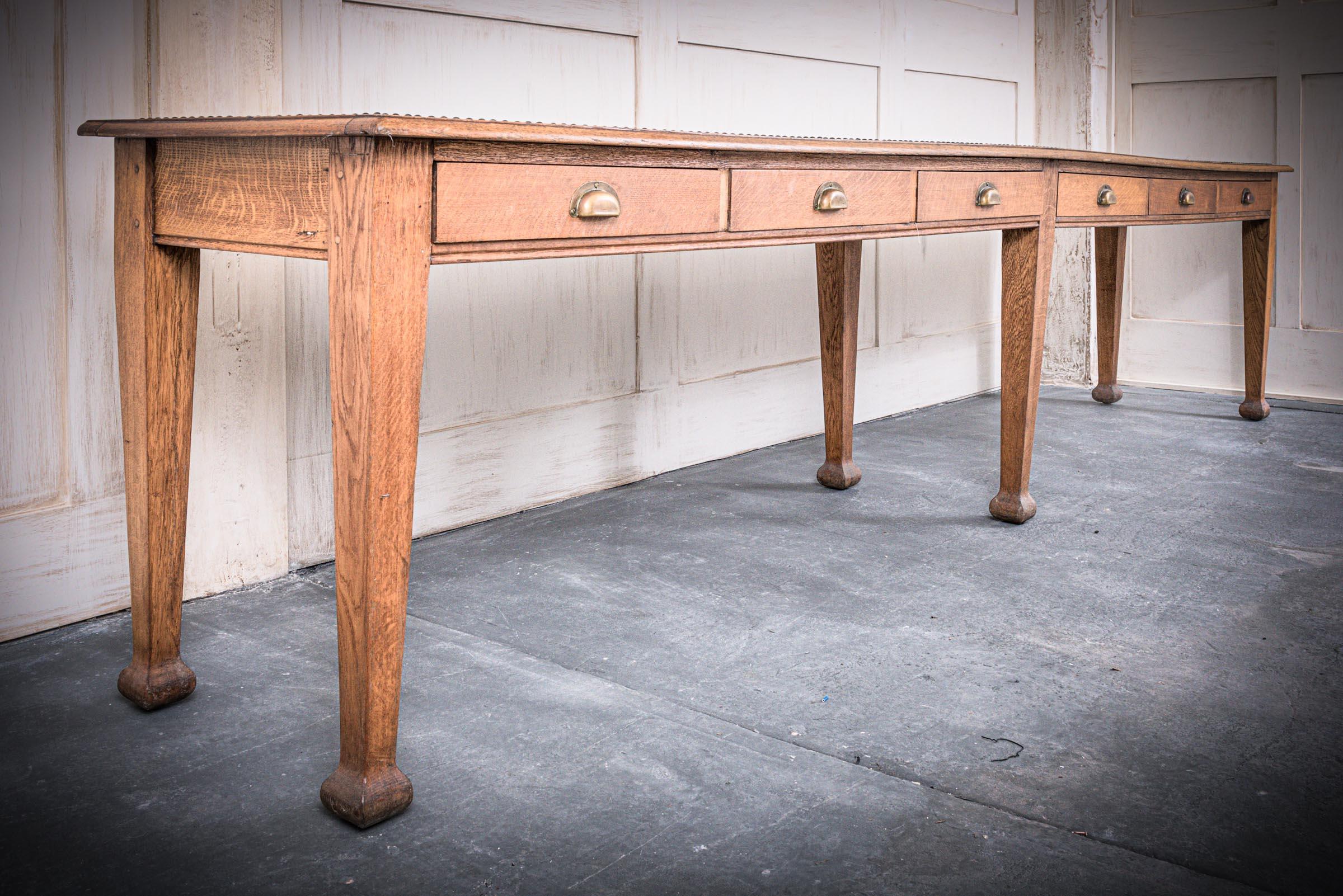 A seriously commanding piece of furniture, dictating its own presence, possibly doubling up as an over-extended long console table. Circa 1880, this quality Victorian medullary rayed quarter cut oak British library table requires some space but will