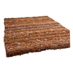 Alfombra Selvedge de fabricación británica - naranja y marrones