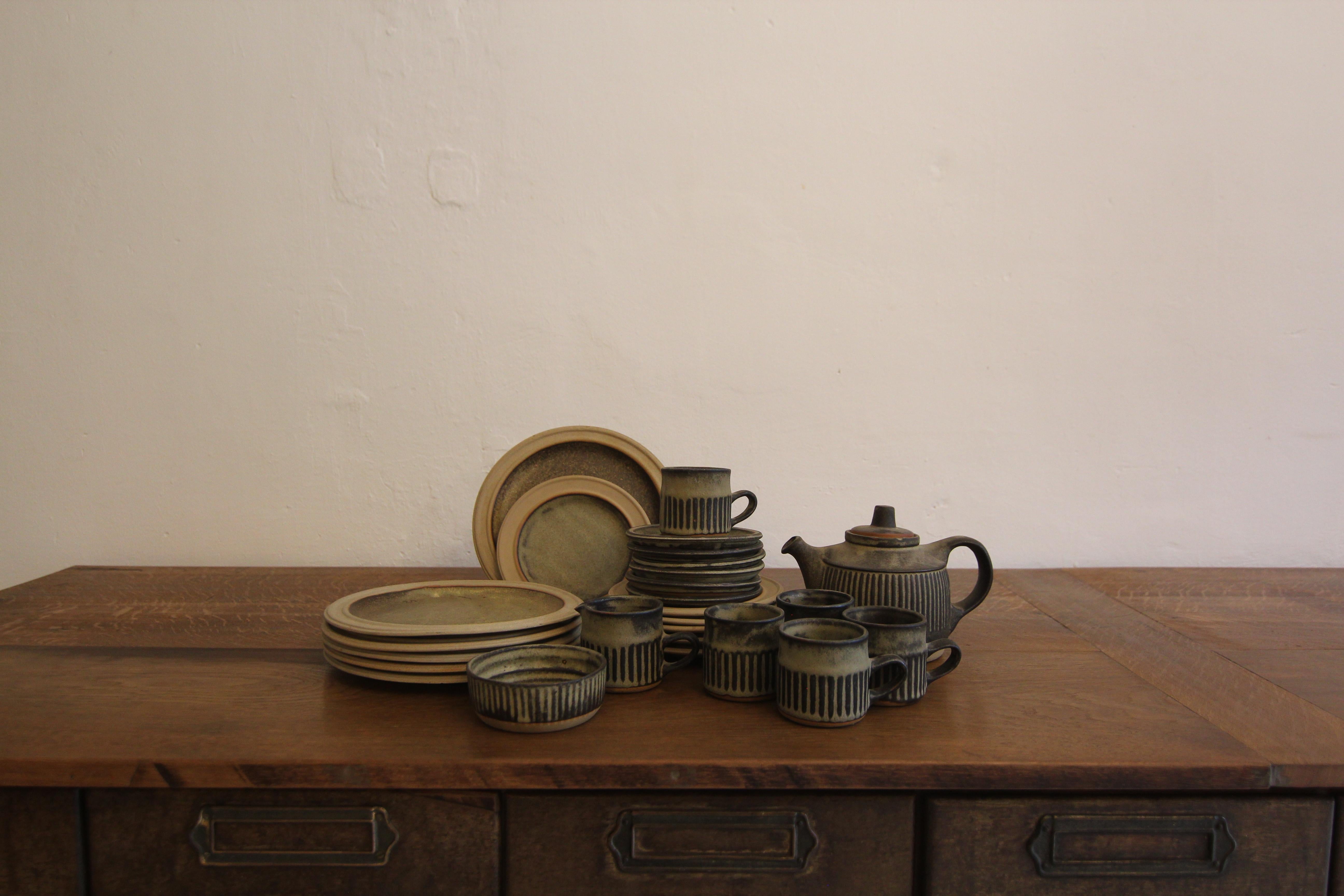 A classic 1960`s or 1970´s tea set from Tremar Pottery.

Tremar Pottery is a British ceramics brand that was founded in the 1960s in the small village of Tremar in Cornwall. It was created by Roger and Doreen Butts, who produced ceramics with a
