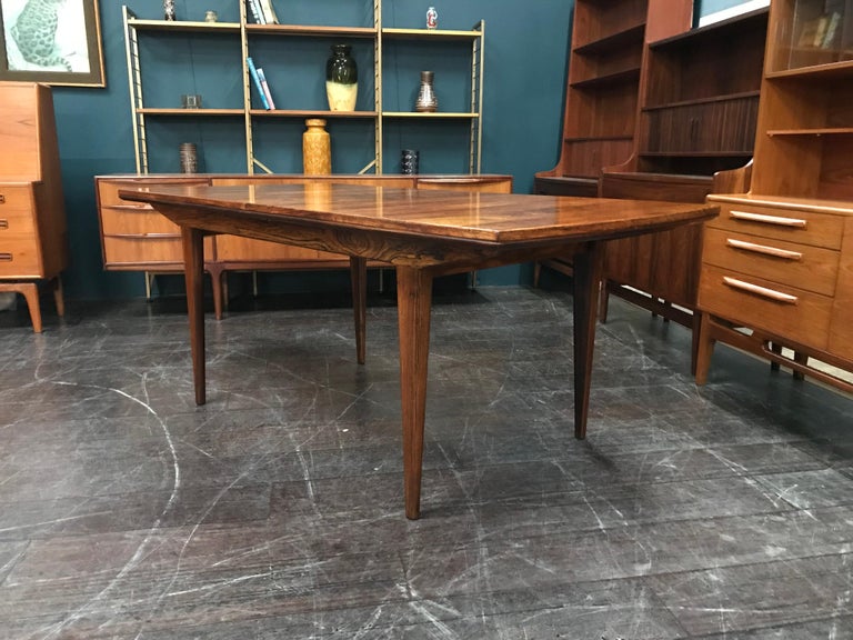 English British Midcentury Extending Rosewood Dining Table by Alfred Cox For Sale