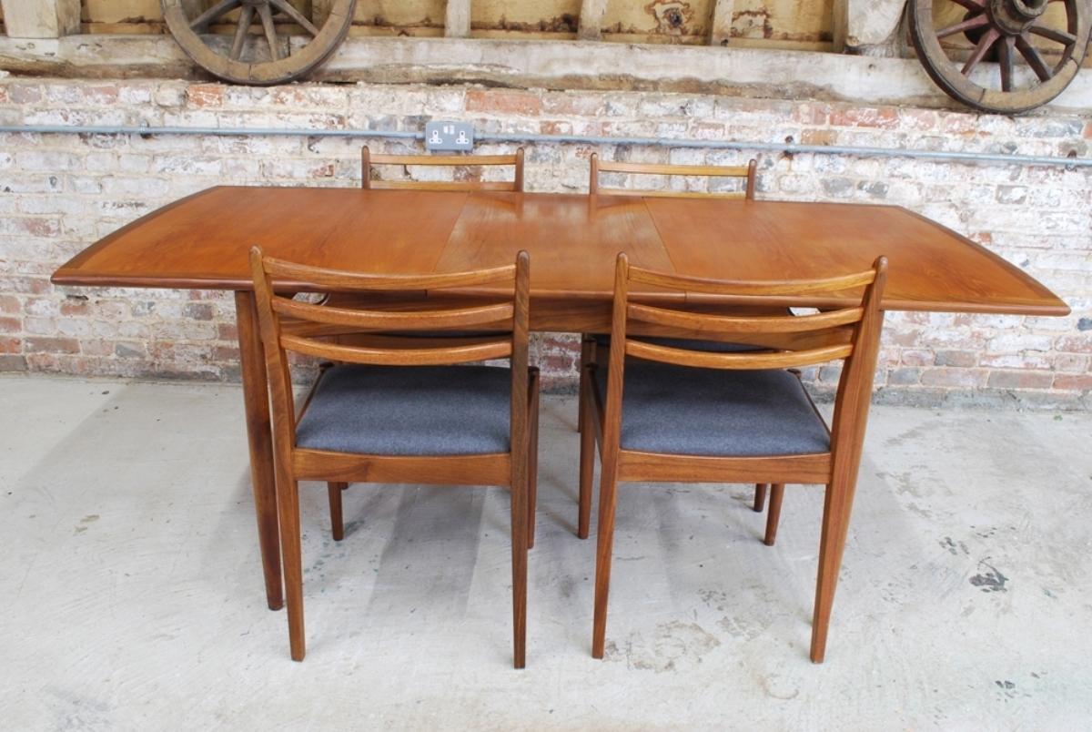 European British Midcentury Teak Extending Dining Table & Chairs by G Plan For Sale