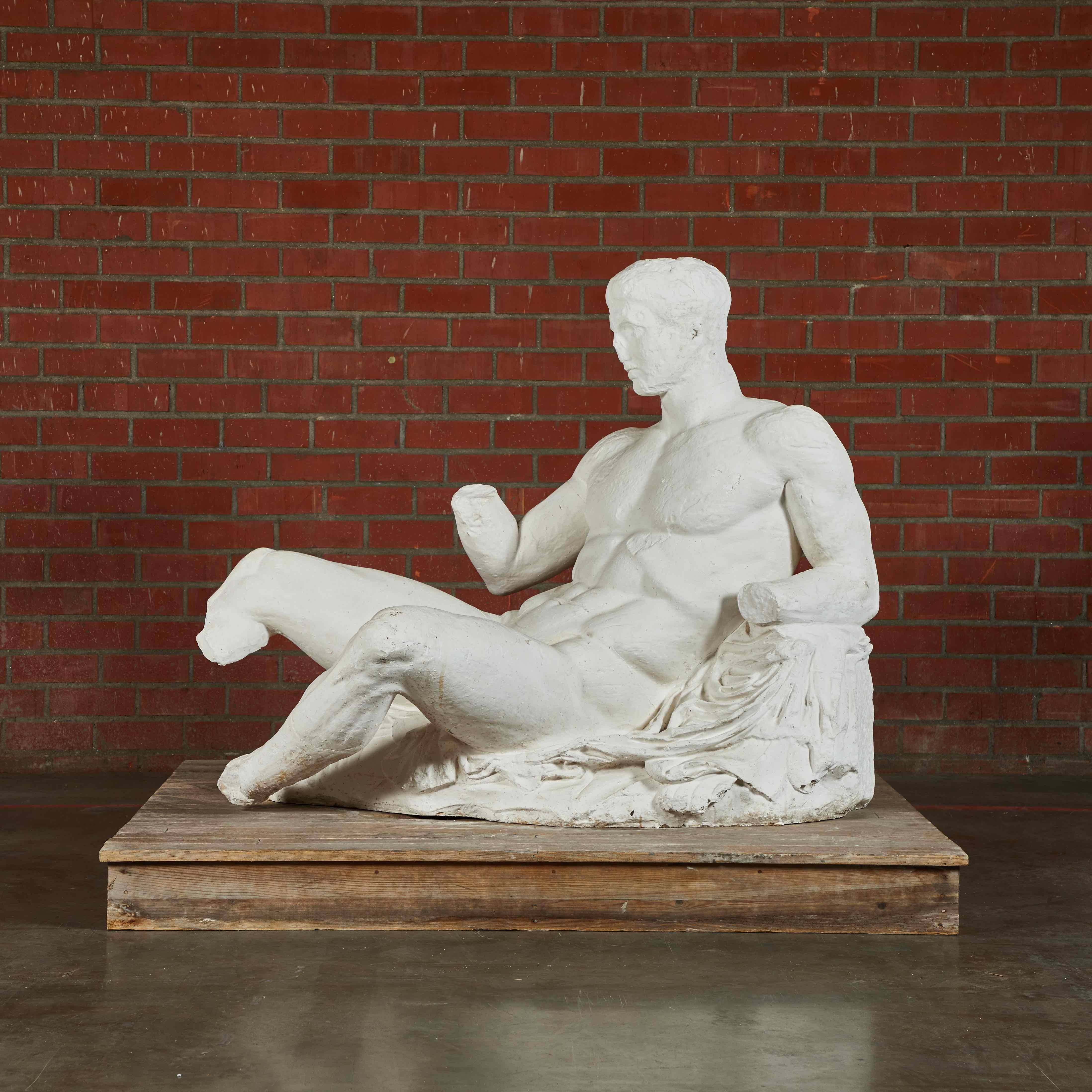 British Museum plaster cast of young Dionysos from the east pediment of the Parthenon. Dionysos is known as the good of wine. Art Schools used casts from the British Museum for teaching, and museums placed these casts of famous elements alongside