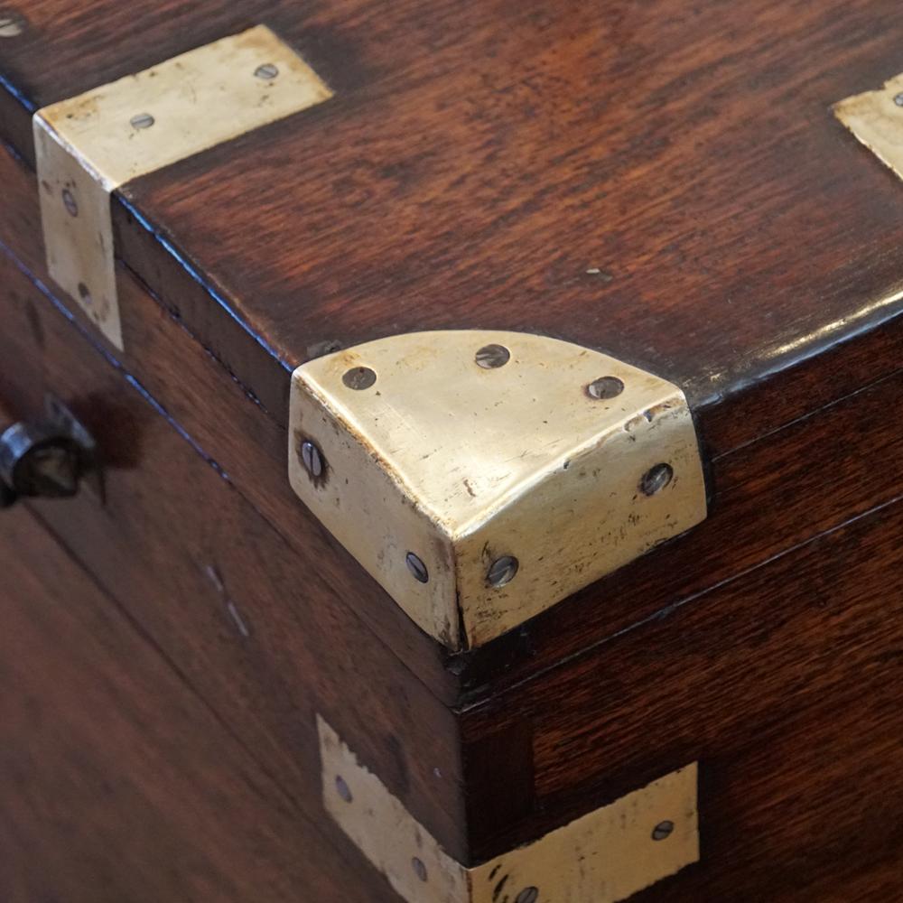 This Victorian brass bound military chest was made circa 1860.
Here we have this Victorian trunk that would have been used by a British officer to transport his uniforms and valuables around the Empire.
This chest is made of teak, a timber that is
