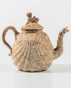 British Pottery Solid Agate Pecten Shell Teapot and Cover, circa 1755-1760