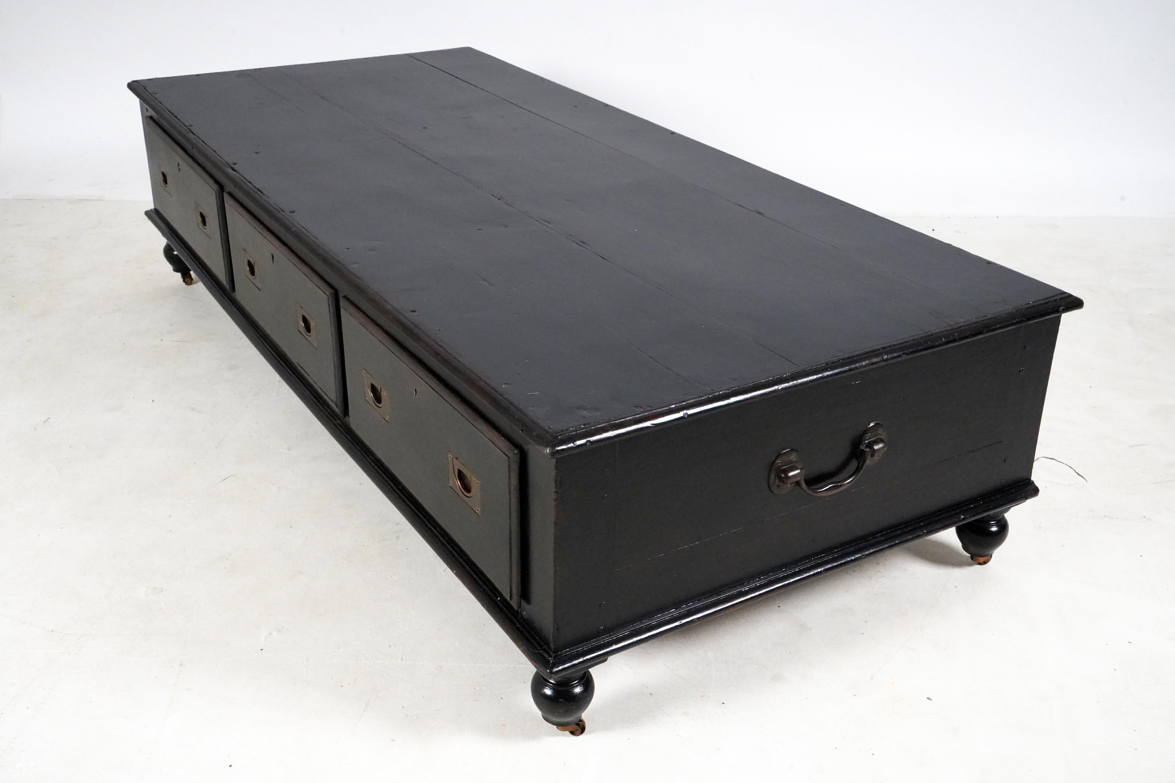 This large and sturdy Indian daybed coffee table features large storage drawers with British-made Campaign handles. Daybeds like this were used by Indians who used them as temporary (during the day) napping areas with a thin pad or also at night.