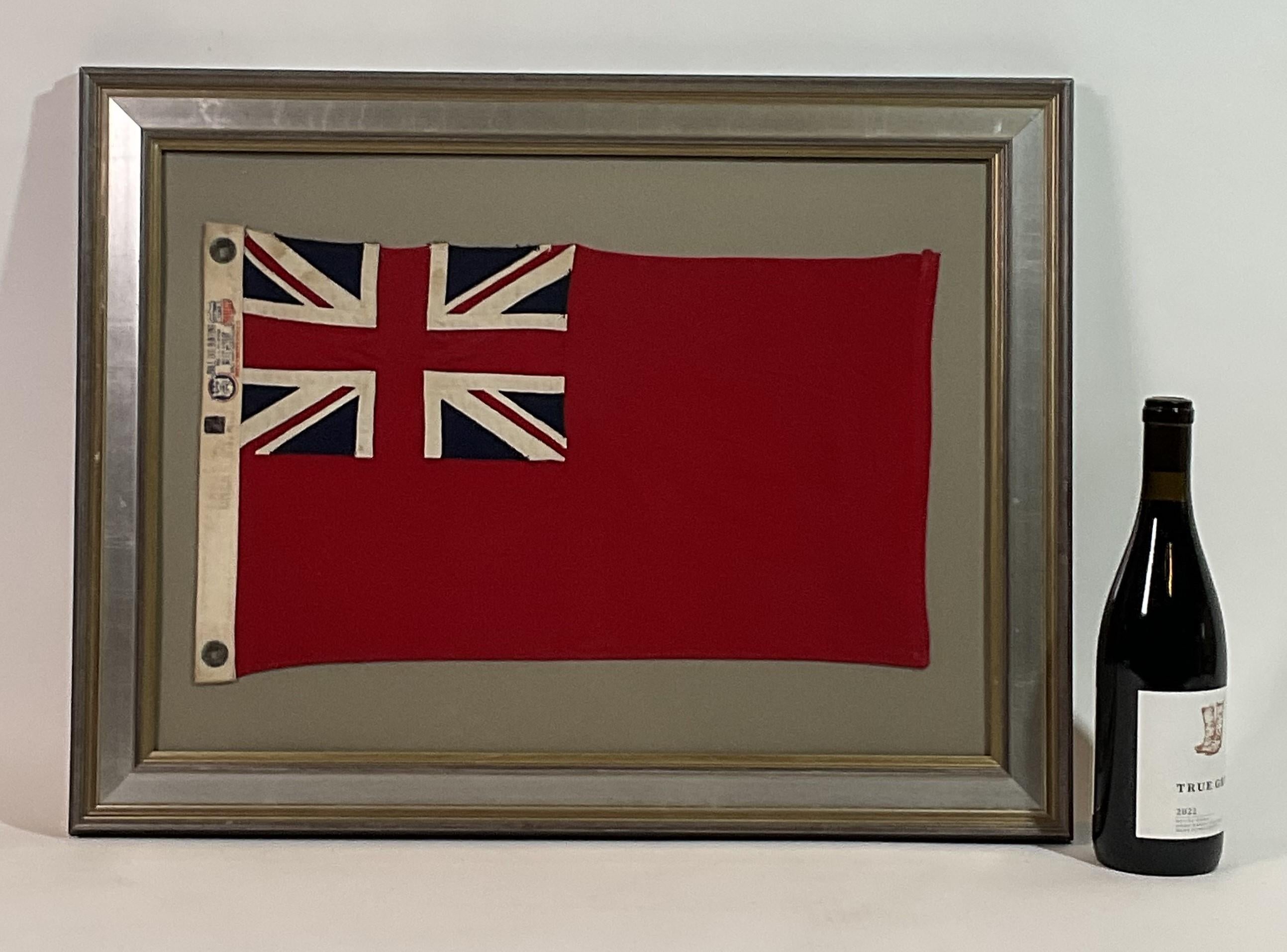 Framed English navy red ensign flag. Red field with Union Jack in the top left corner. Canvas bunting with label from Dettra Bulldog and brass grommets.

Weight:    6 lbs.
Overall Dimensions:    20