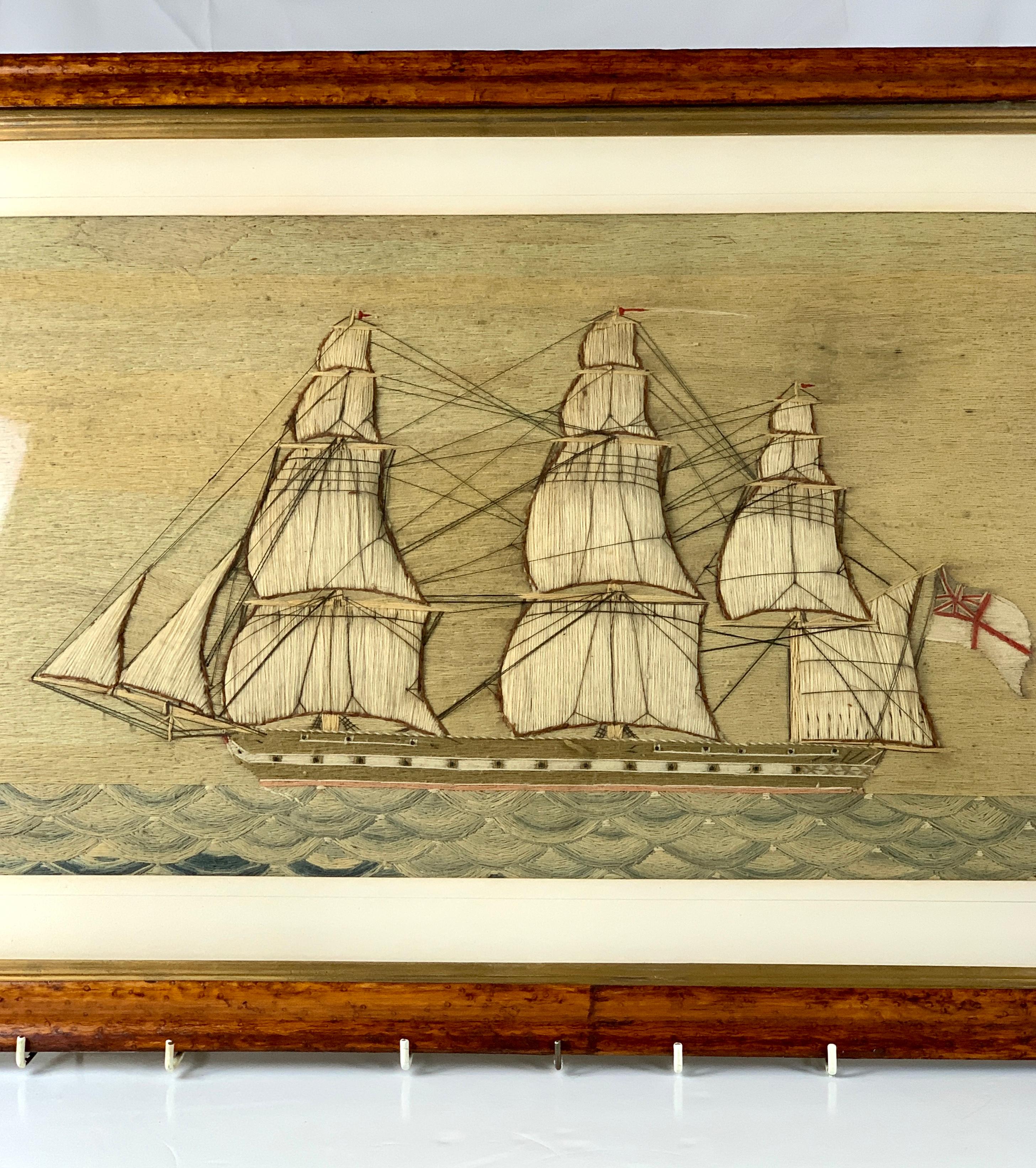 This large 19th century sailor's Woolie of a British line-of-battle ship, circa 1840is
 is hand embroidered with woolen yarn. It depicts a British naval ship under full sail with canon showing and flying the British Royal Naval Ensign.
The ship has