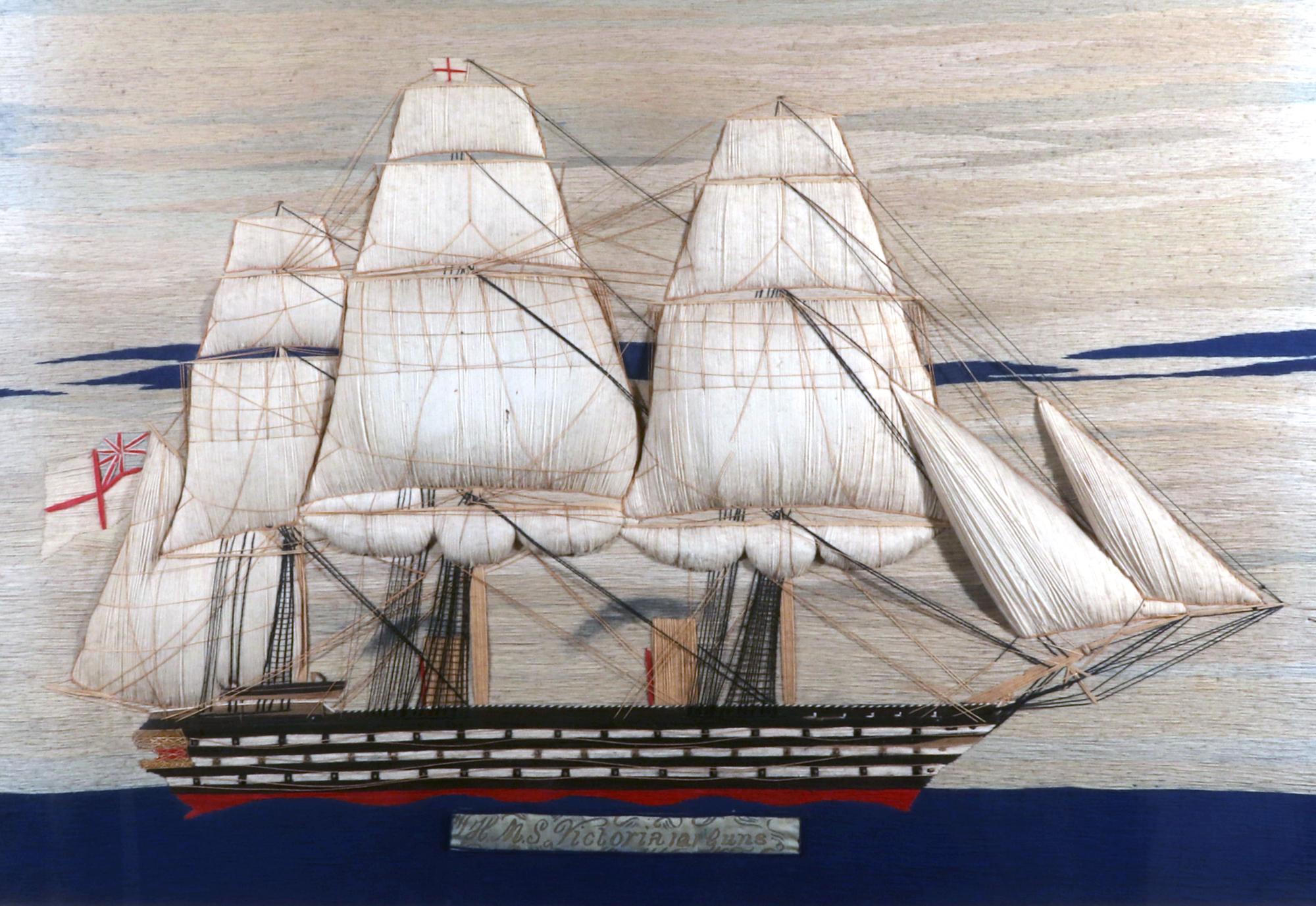 Large British sailor's woolwork woolie of HMS Victoria,
Berlin wool on linen (Duck),
circa 1865

The large sailor's woolwork or woolie depicts HMS Victoria, named below on a banner, with large billowing Trapunto sails. HMS Victoria was the last