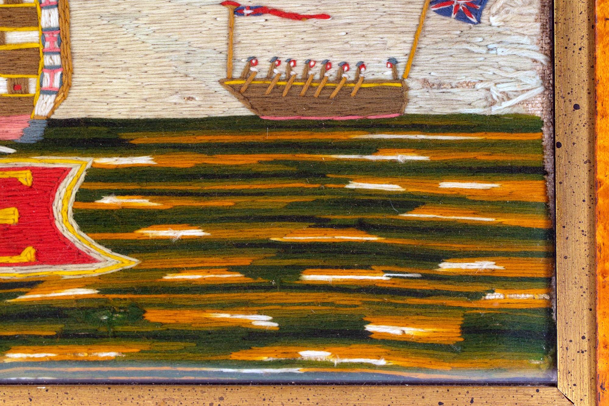 British Sailor's Woolwork of Royal Navy Ship H.M.S. St George, 
 CIRCA 1860  
 
 Eine naive Matrosenwolle mit einer Hafenansicht der H.M.S. St. George, die unten auf einem roten Banner genannt wird, dem erstklassigen Schlachtschiff, das in voller