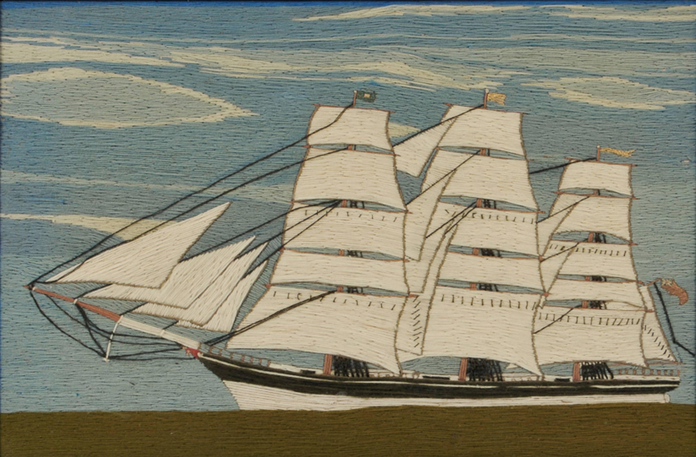 British sailor's woolwork of a merchant navy ship,
circa 1865-1885.

The sailor's woolie in a maple frame depicts a portside view of a three-masted merchant navy ship in full sail on an unusual green sea with a white hull against a good sky still