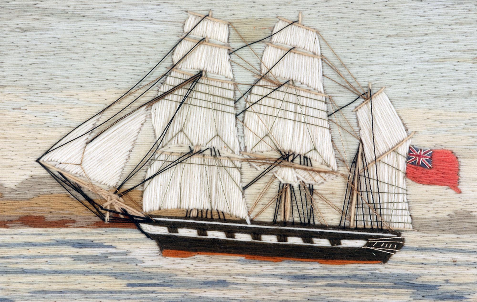 British Sailor's Woolwork of a Royal Navy Ship
circa 1765

The sailor's woolwork depicts a port side view of a three-masted British Royal Navy ship sailing on a blue sea with a lot of white heads. The ship is coming into land which can be seen to