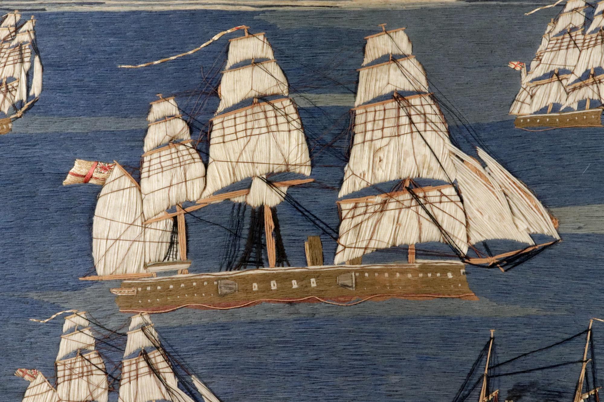 Folk Art British Sailor's Woolwork Picture of Five Ships Off a Coastline For Sale