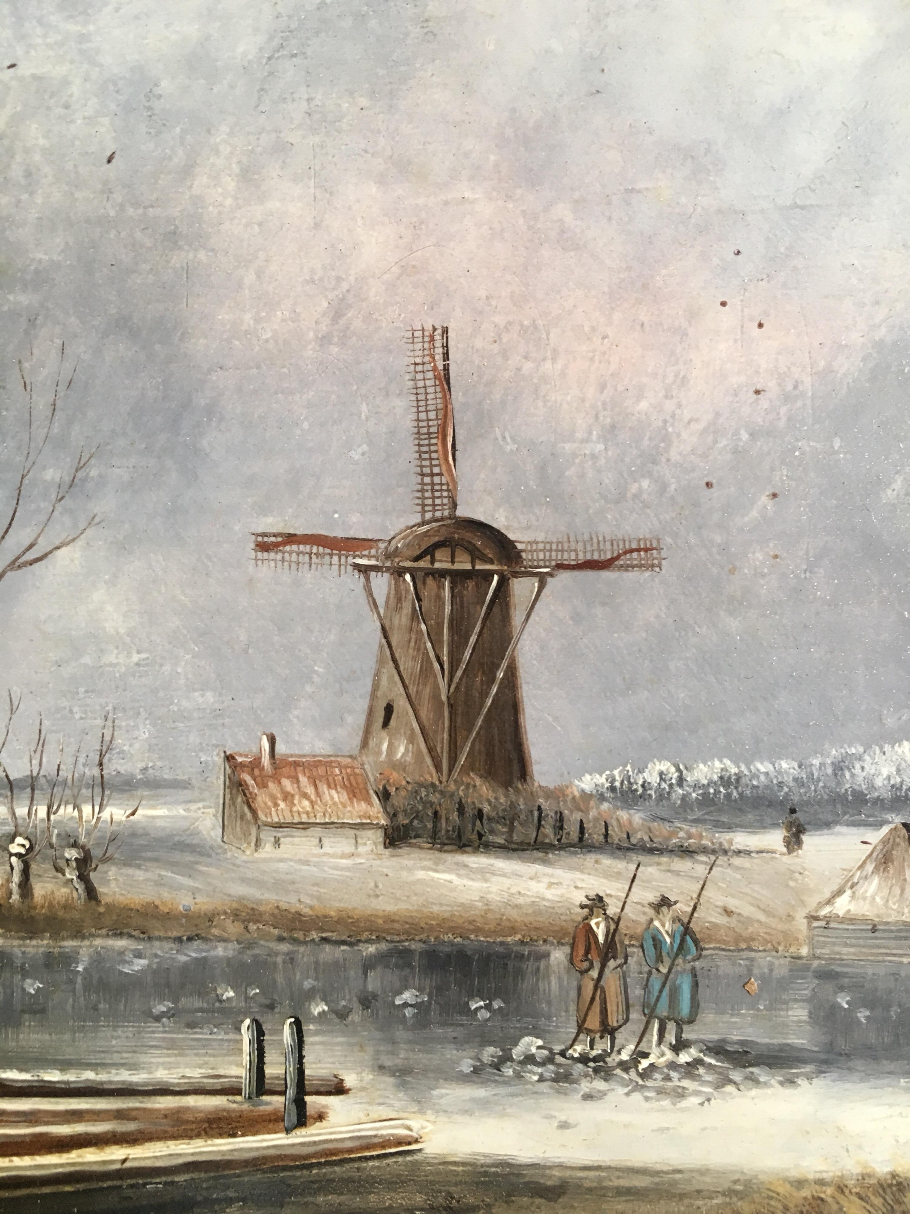 The Old Windmill
British School, 19th century
Oil painting on wood panel, framed
Framed size: 10 x 13 inches

Fine quality depiction of a traditional frozen Dutch winters landscape. There is an old windmill in the distance, with figures walking
