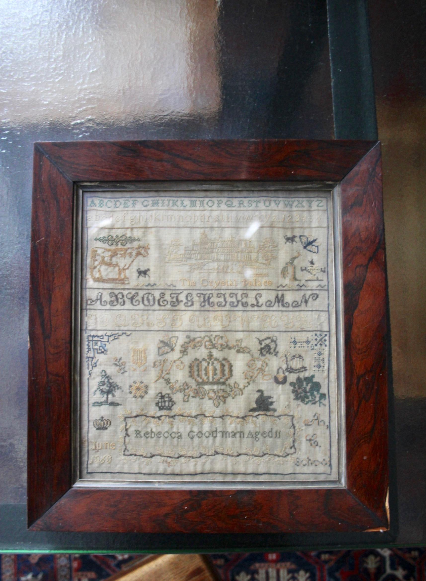 English embroidered needlework tapestry sampler picture signed by Rebecca Goodman and dates June 1860