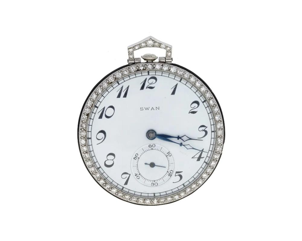 A British Swan Watch Co Platinum pocket watch made in the Art Deco manner. A white enameled dial with black Arabic numerals. The case is encrusted with Diamonds. Marked with a Swan Watch Co mark, Seventeen 17 Jewels, Unadjusted marks, inside. Marked
